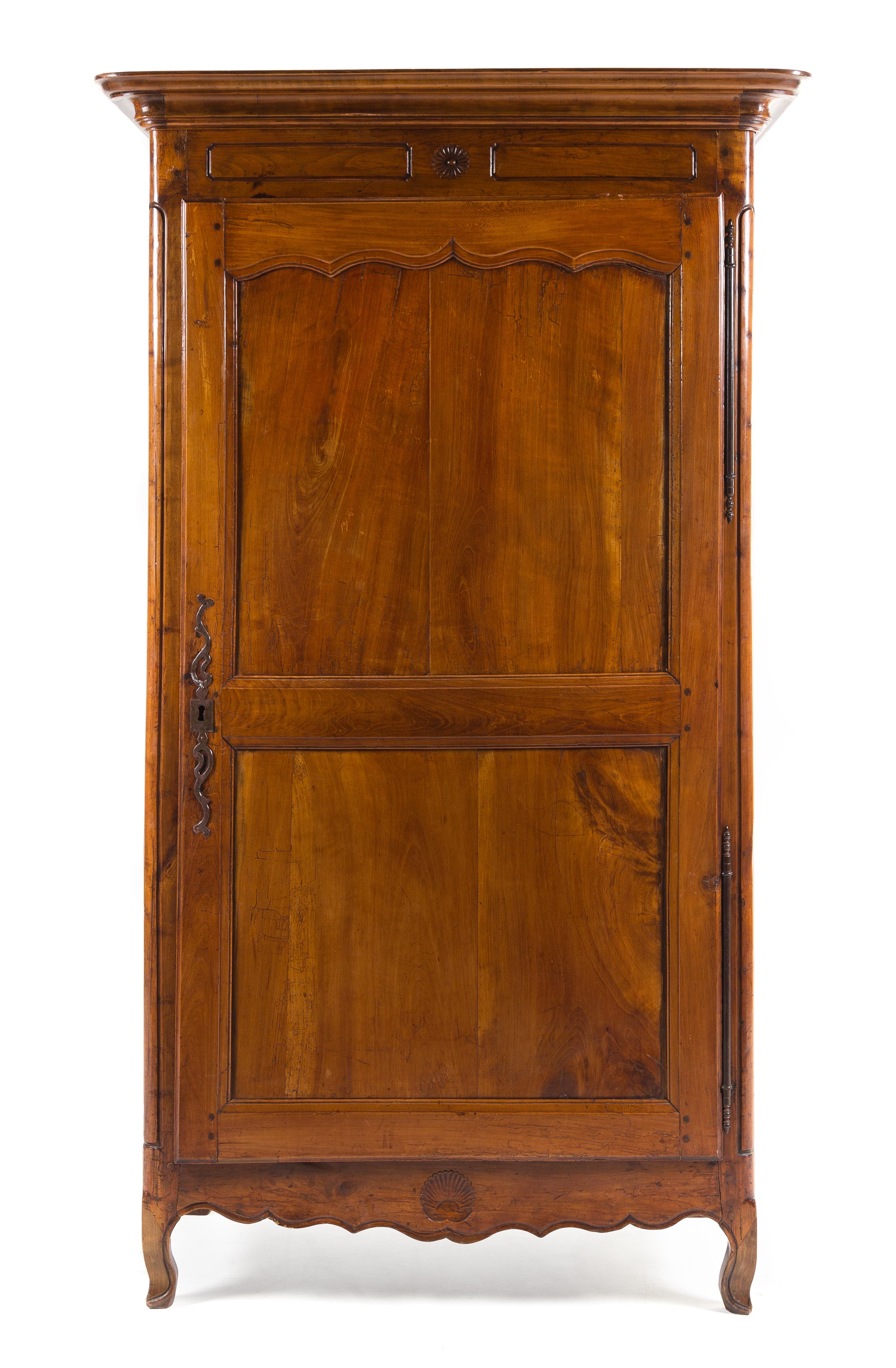 A Louis Philippe Walnut Armoire Height 79 1/8 x width 45 1/4 x depth 25 inches. — MID-19TH CENTURY