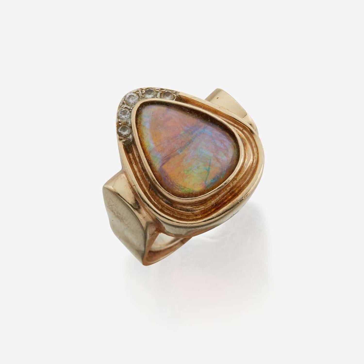 An opal, diamond, and gold ring