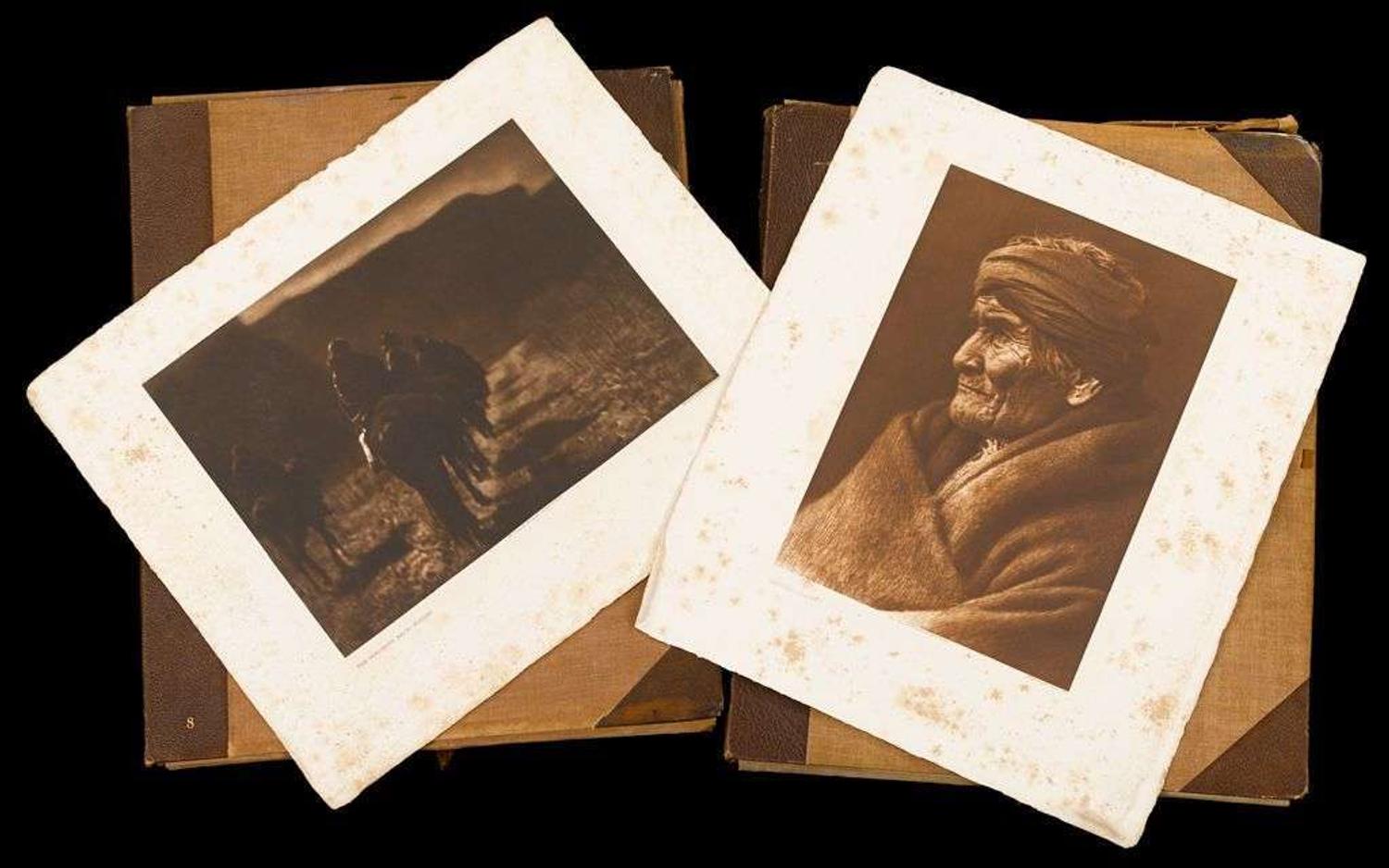 Two portfolios with eighty-five photogravure plates after Edward S. Curtis (1868-1952) printed by john andrew & son, boston, ma, 1907-1930