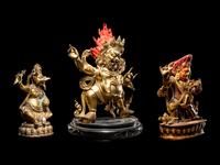 Three Tibetan Gilt Bronze Figures of Guardians
