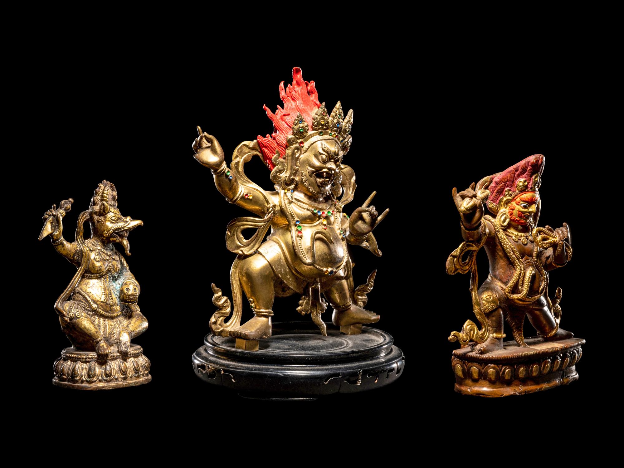 Three Tibetan Gilt Bronze Figures of Guardians