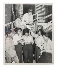 [WORLD WAR II & VIETNAM]. A group of 14 snapshots including portraits of prize fighter Toikey Thompson and black female combat nurses, including: