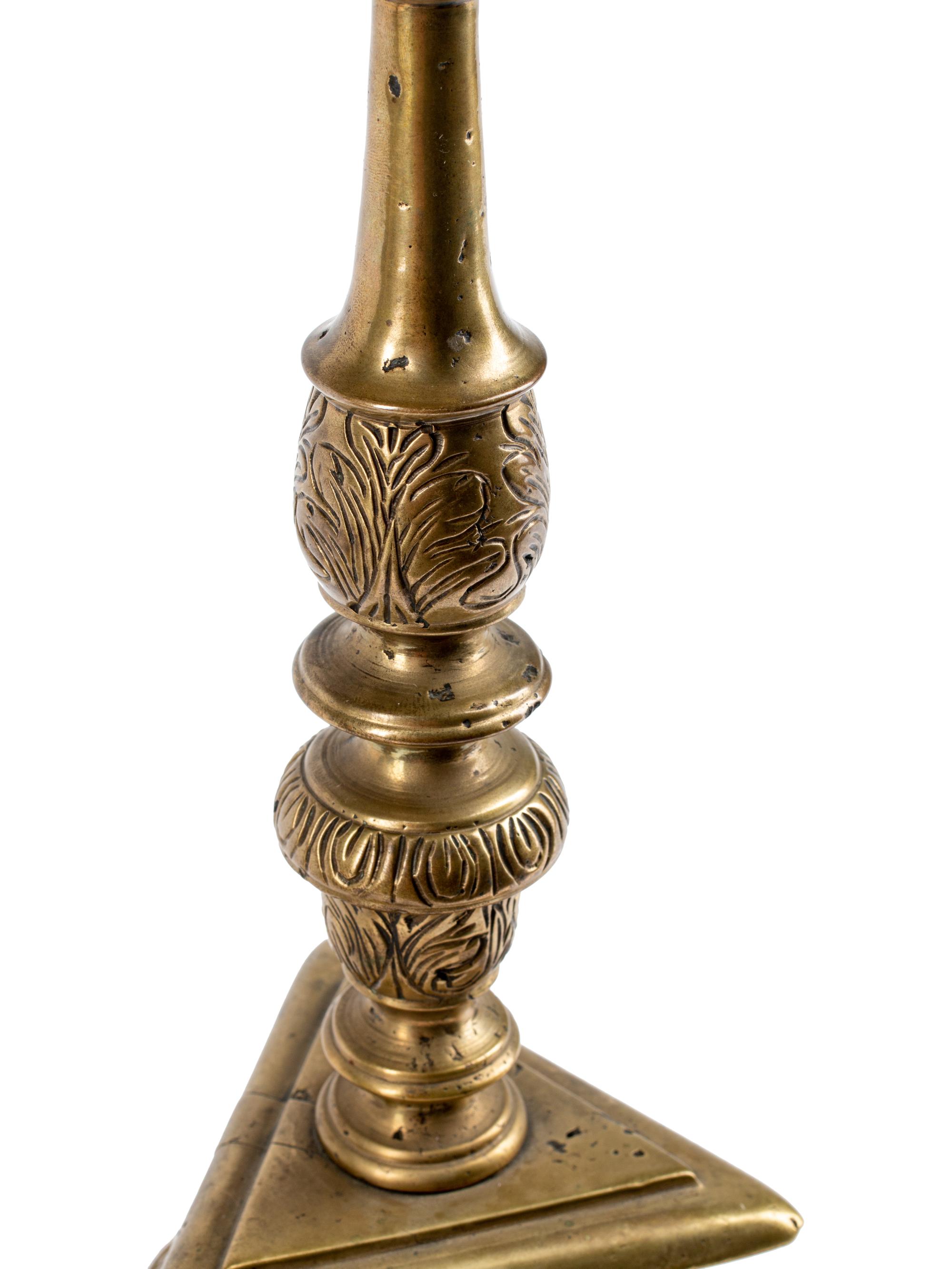A Pair of Continental Brass Prickets