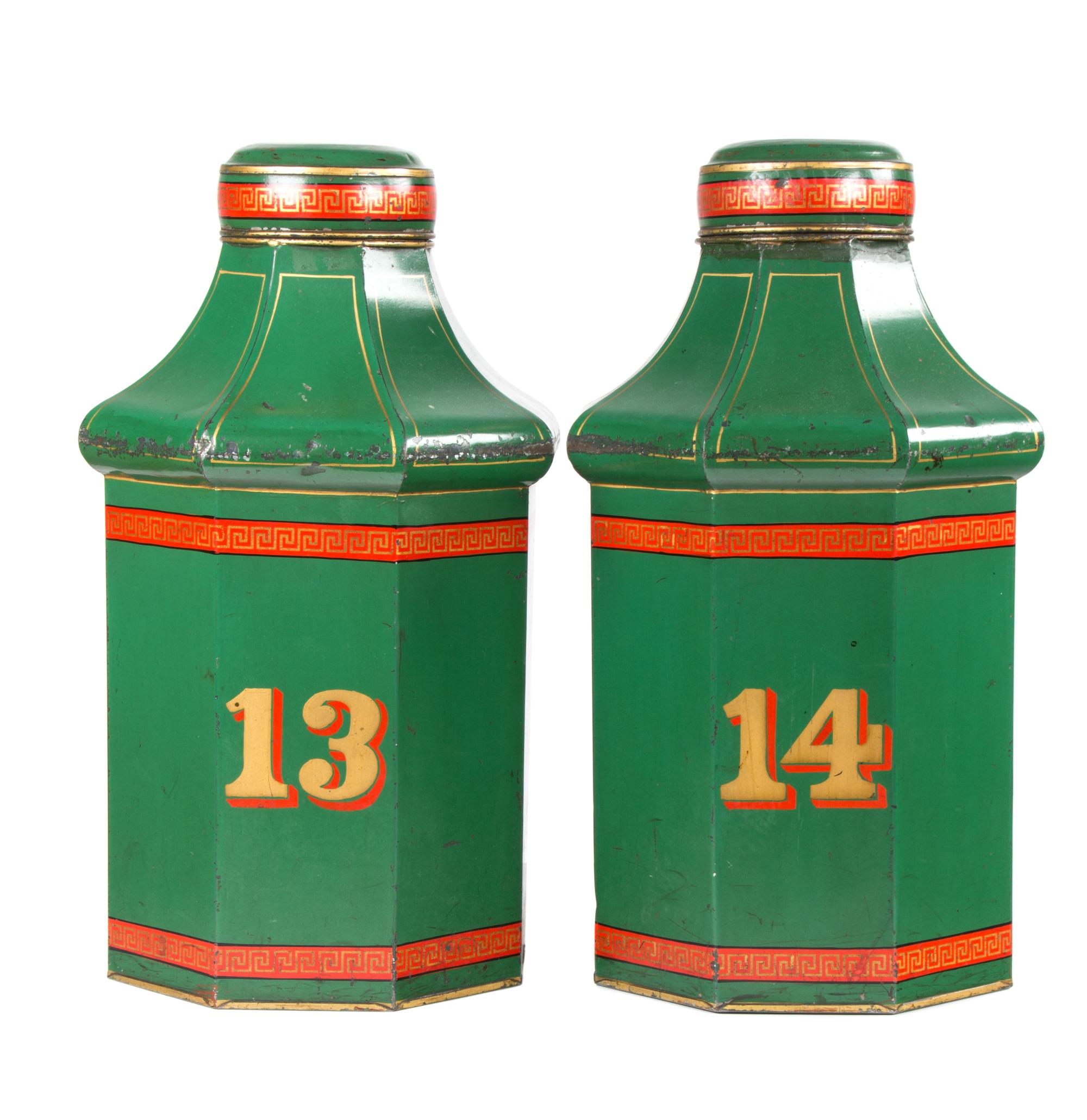 A Pair of Tole Canisters Height 23 inches.