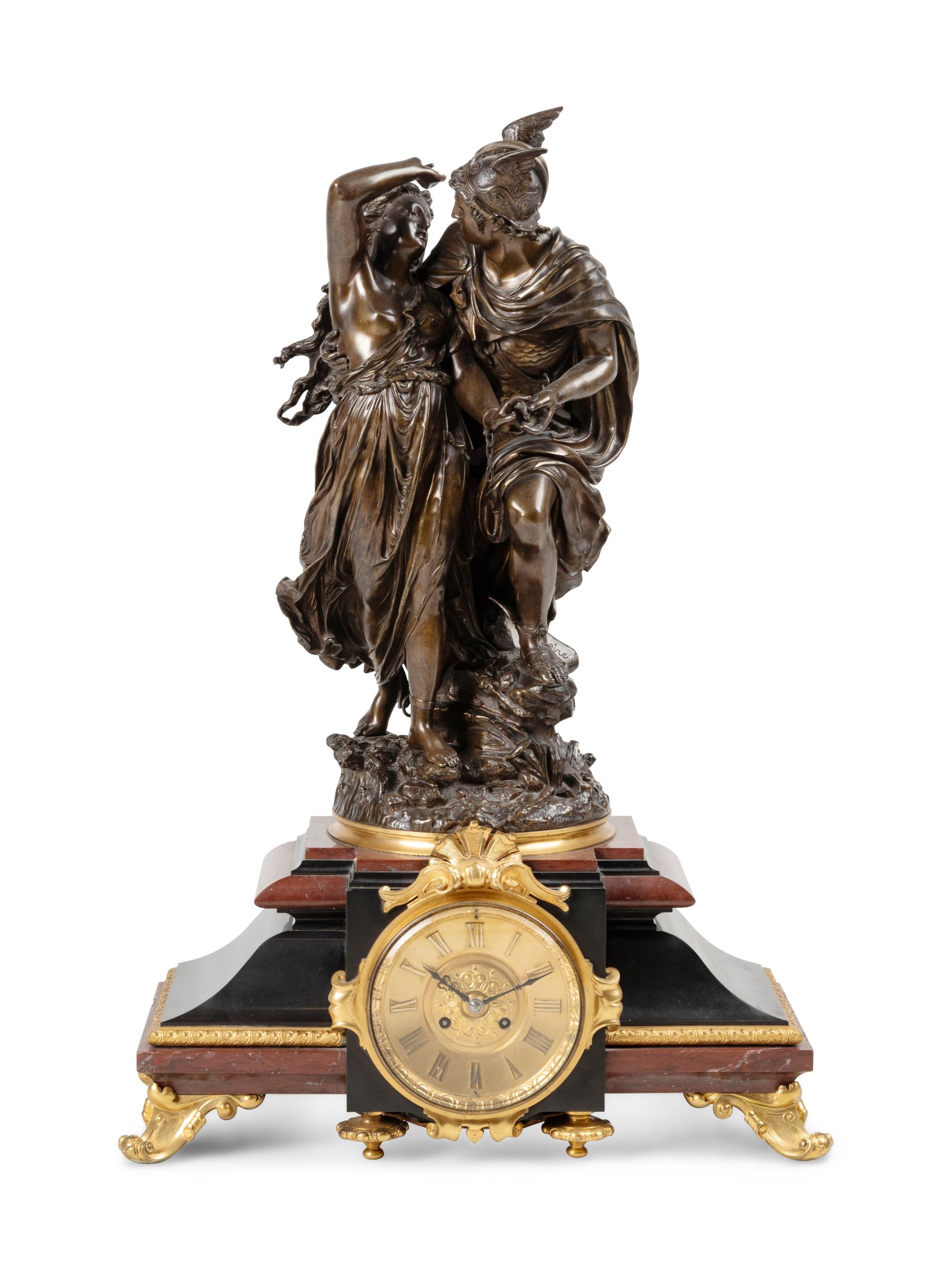 A French Gilt and Patinated Bronze and Marble Mantel Clock