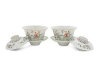 A Pair of Famille Rose Porcelain 'Boys' Covered Bowls and Stands