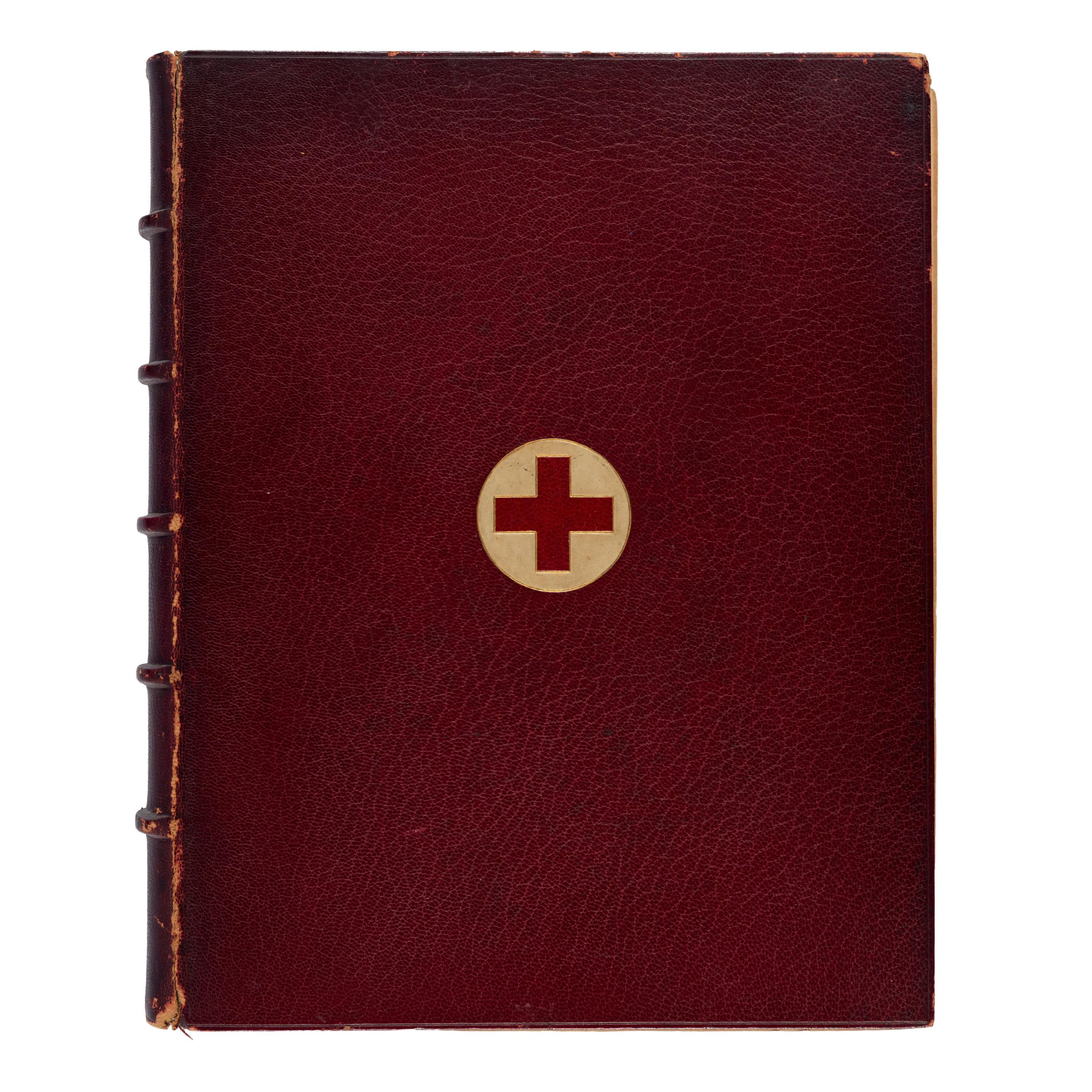 [The Red Cross]. An exceptional album of autographs, letters, and original artwork assembled to benefit the British Red Cross during WWI. [N.p.: N.p.], 1917.