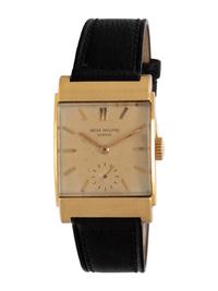 PATEK PHILIPPE, REF. 2479 18K YELLOW GOLD 'CURVED DOME RECTANGULAR' WATCH, WITH EXTRACT FROM THE ARCHIVES