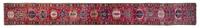 A Heriz Wool Rug 22 feet 4 inches x 2 feet 7 inches.