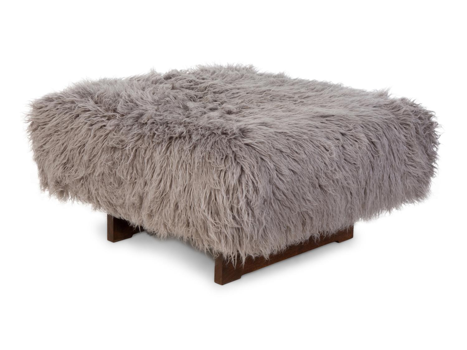 An American Sheepskin-Upholstered Ottoman — 20TH CENTURY