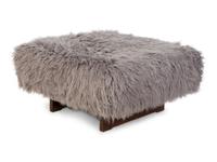 An American Sheepskin-Upholstered Ottoman — 20TH CENTURY
