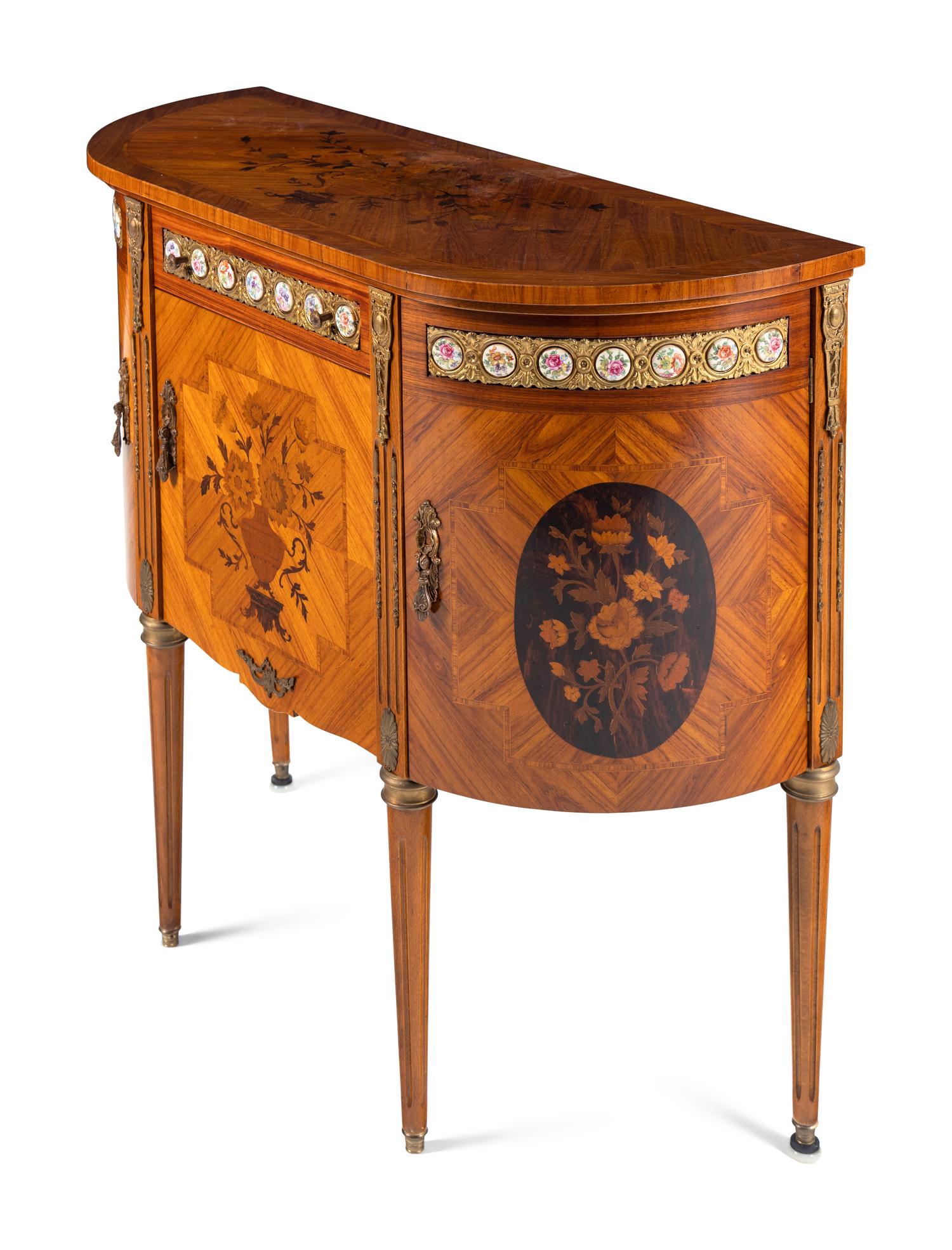 A Louis XVI Style Marquetry, Gilt Metal and Porcelain Mounted Side Cabinet