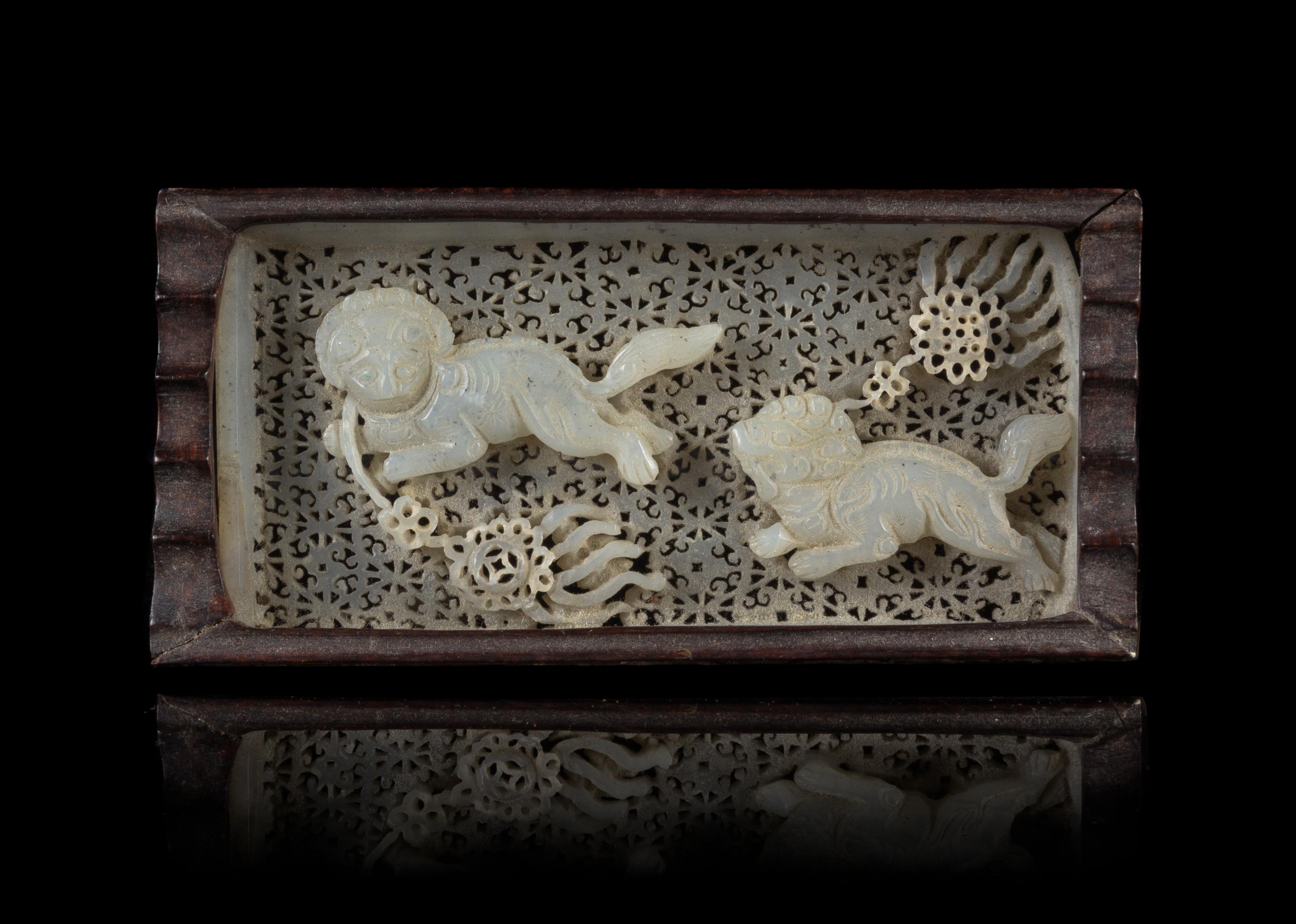 A Reticulated Jade Plaque Length 4 1/2 x width 2 1/4 inches.