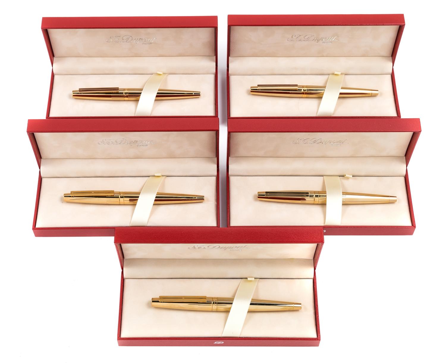 A Group of Five S.T. Dupont Gold-Plated Ellipsis Fountain Pens