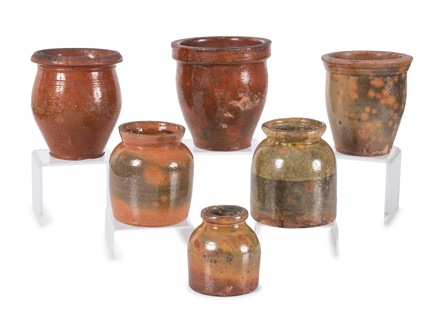 Six Galena Glaze Redware Jars