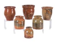 Six Galena Glaze Redware Jars