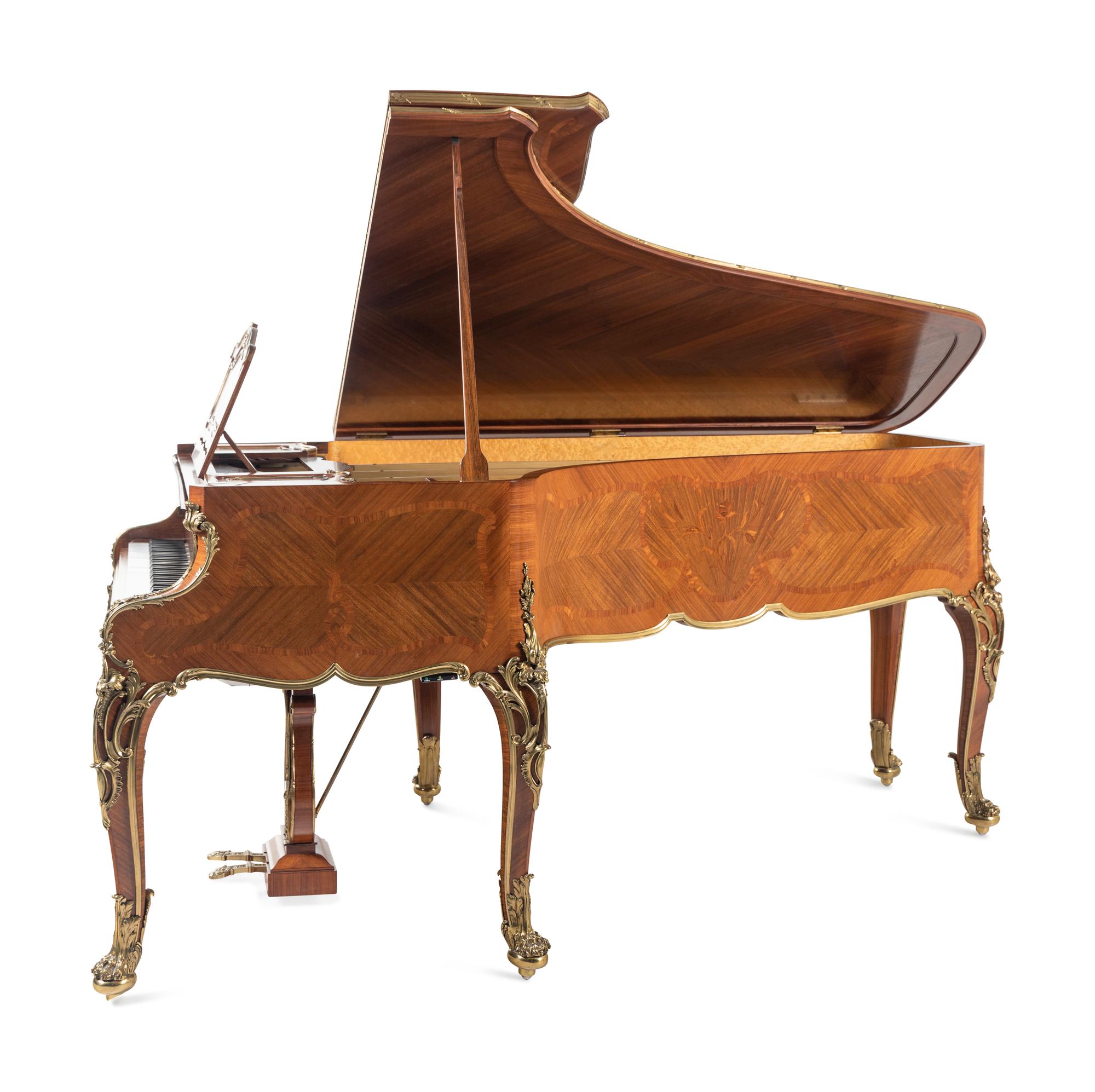A Louis XV Style Gilt Bronze Mounted Kingwood, Bois Satiné, Mahogany and Marquetry Piano à Queue
