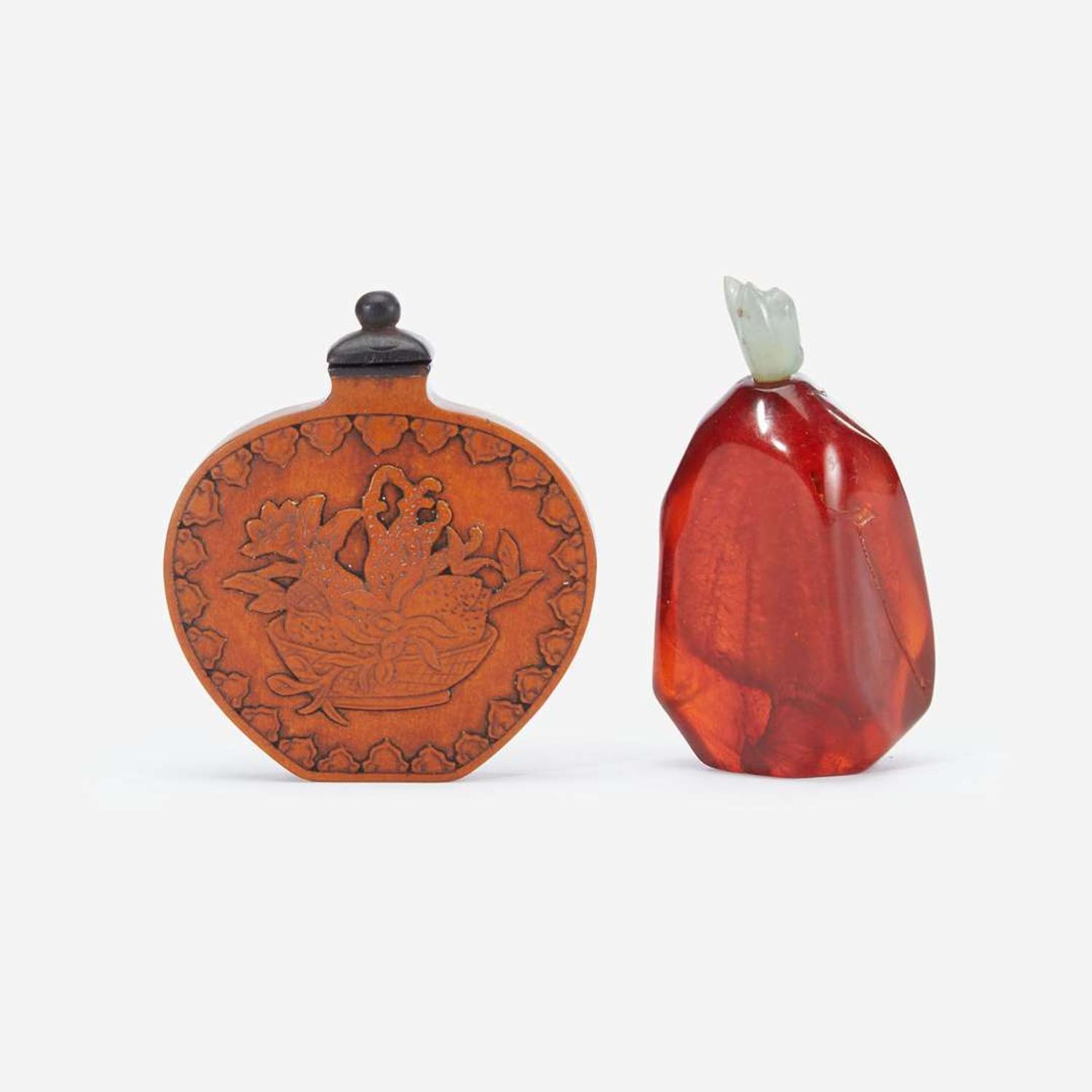 One Chinese bamboo veneer and one amber snuff bottle