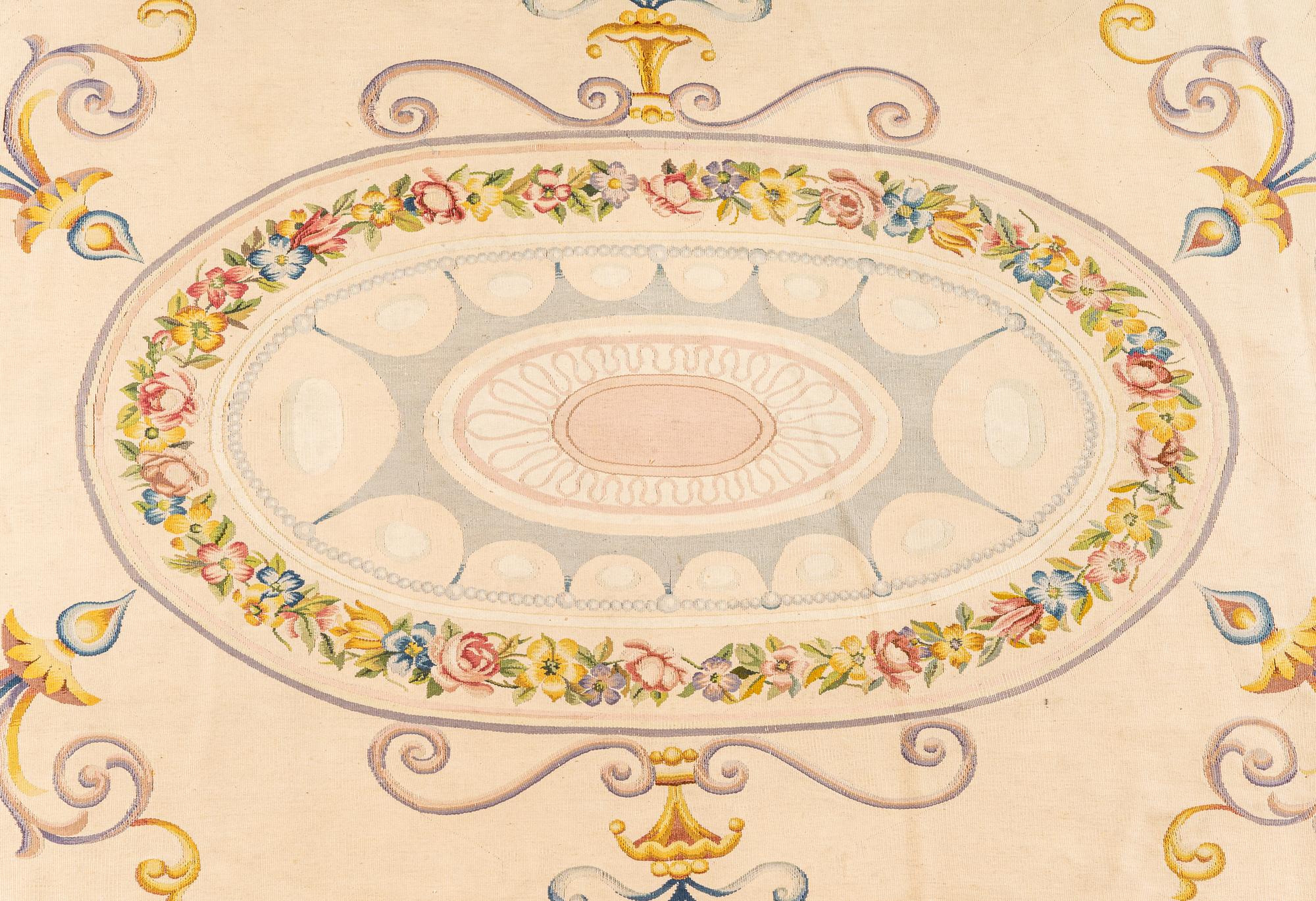 An Aubusson Style Oval Rug