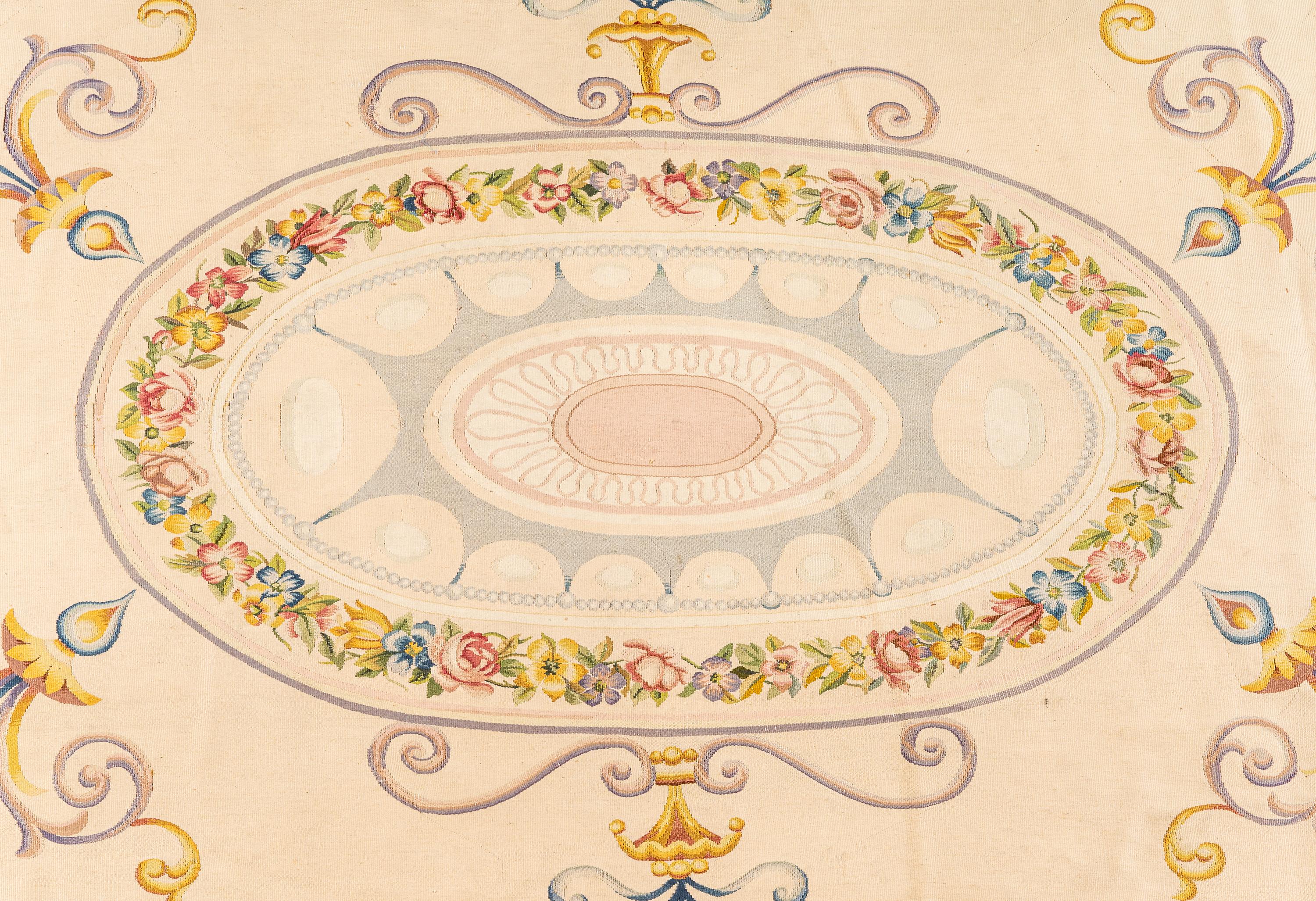 An Aubusson Style Oval Rug