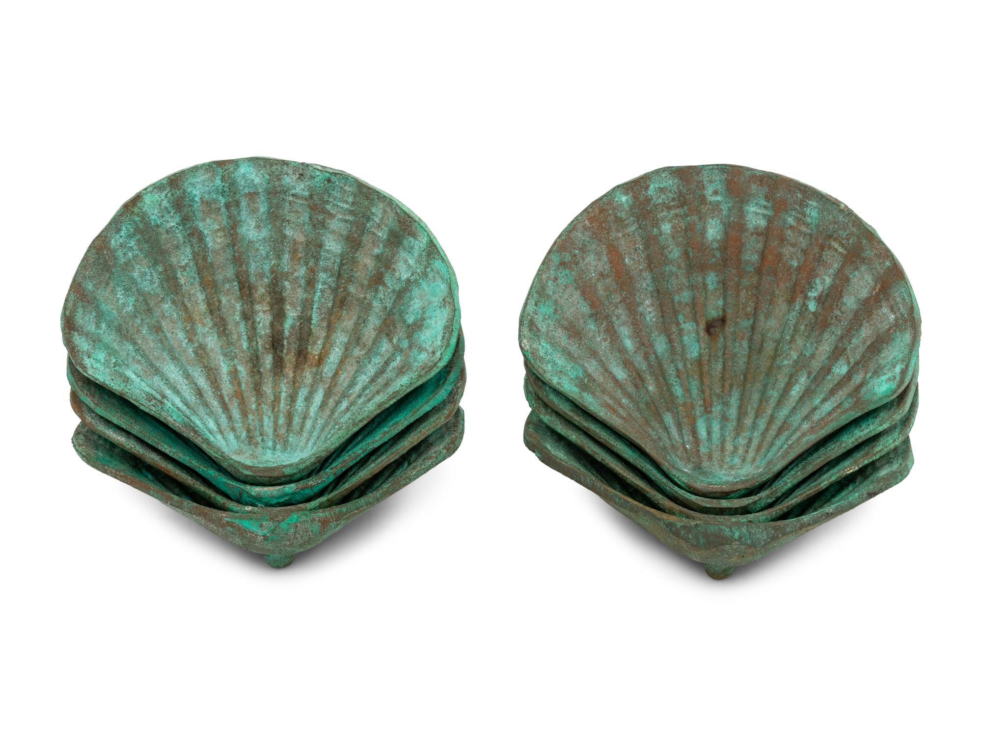 A Set of Eight Bronze Shell-Form Dishes