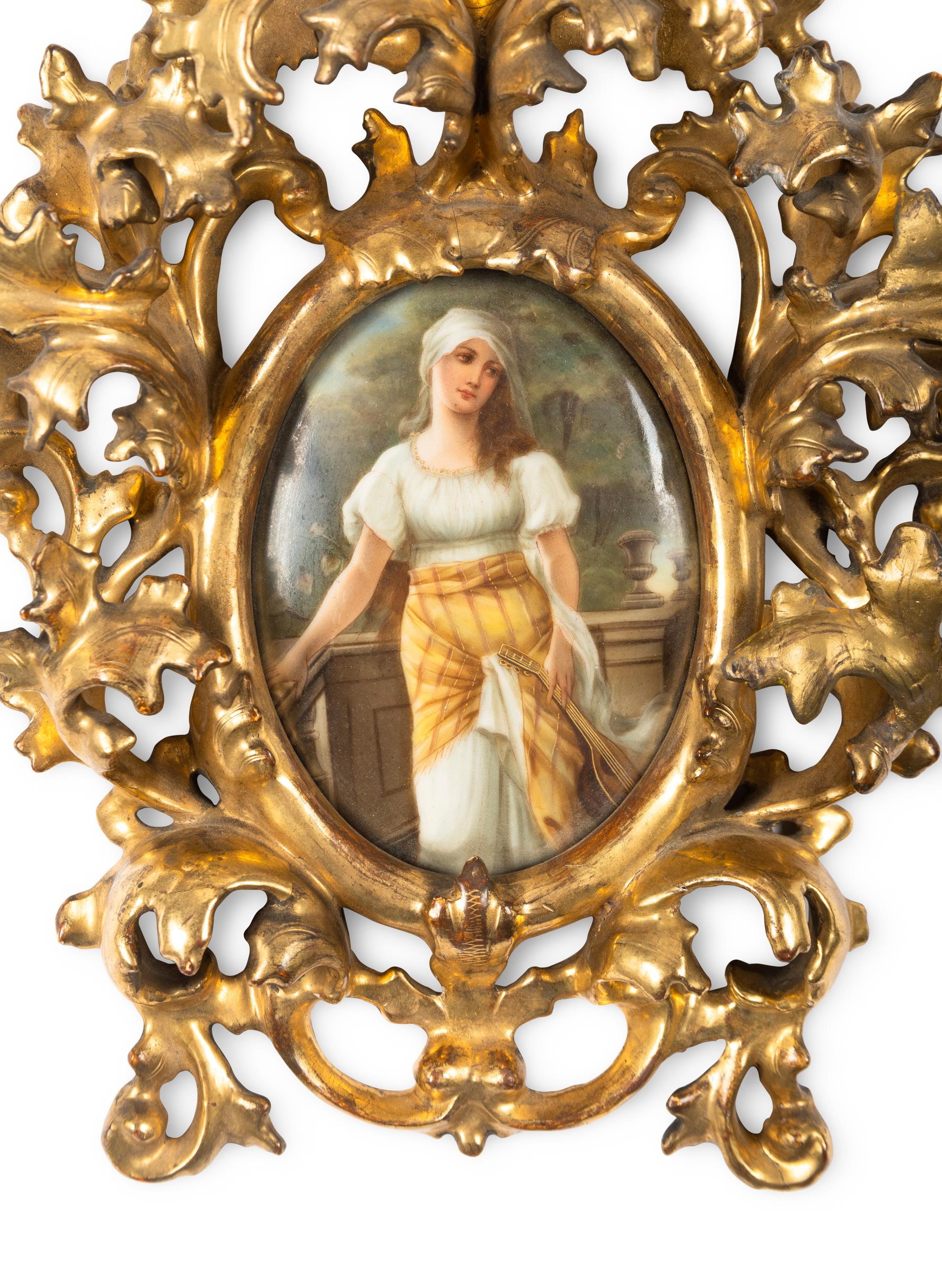 A Continental Porcelain Plaque in a Giltwood Frame