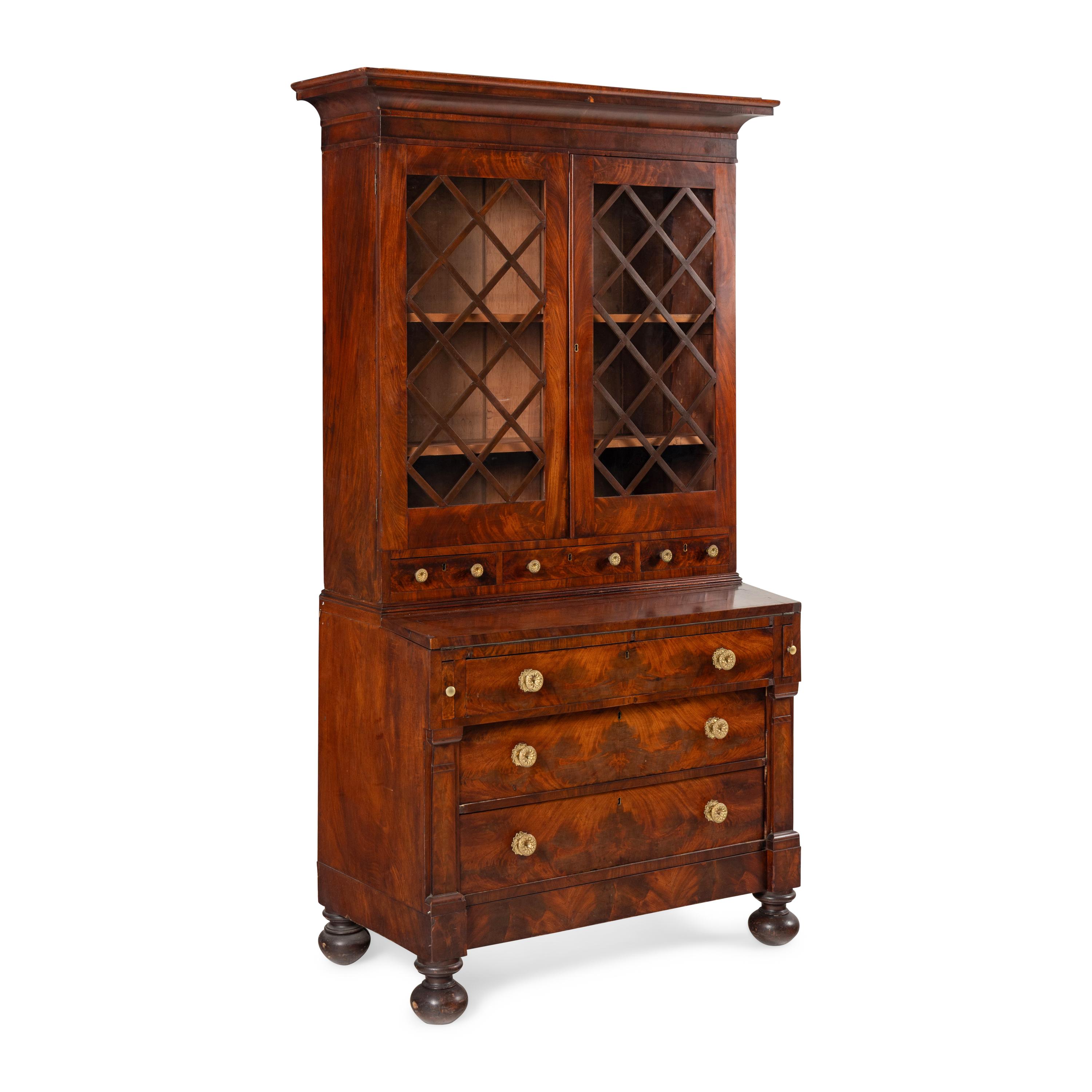 A Classical Mahogany Desk and Bookcase