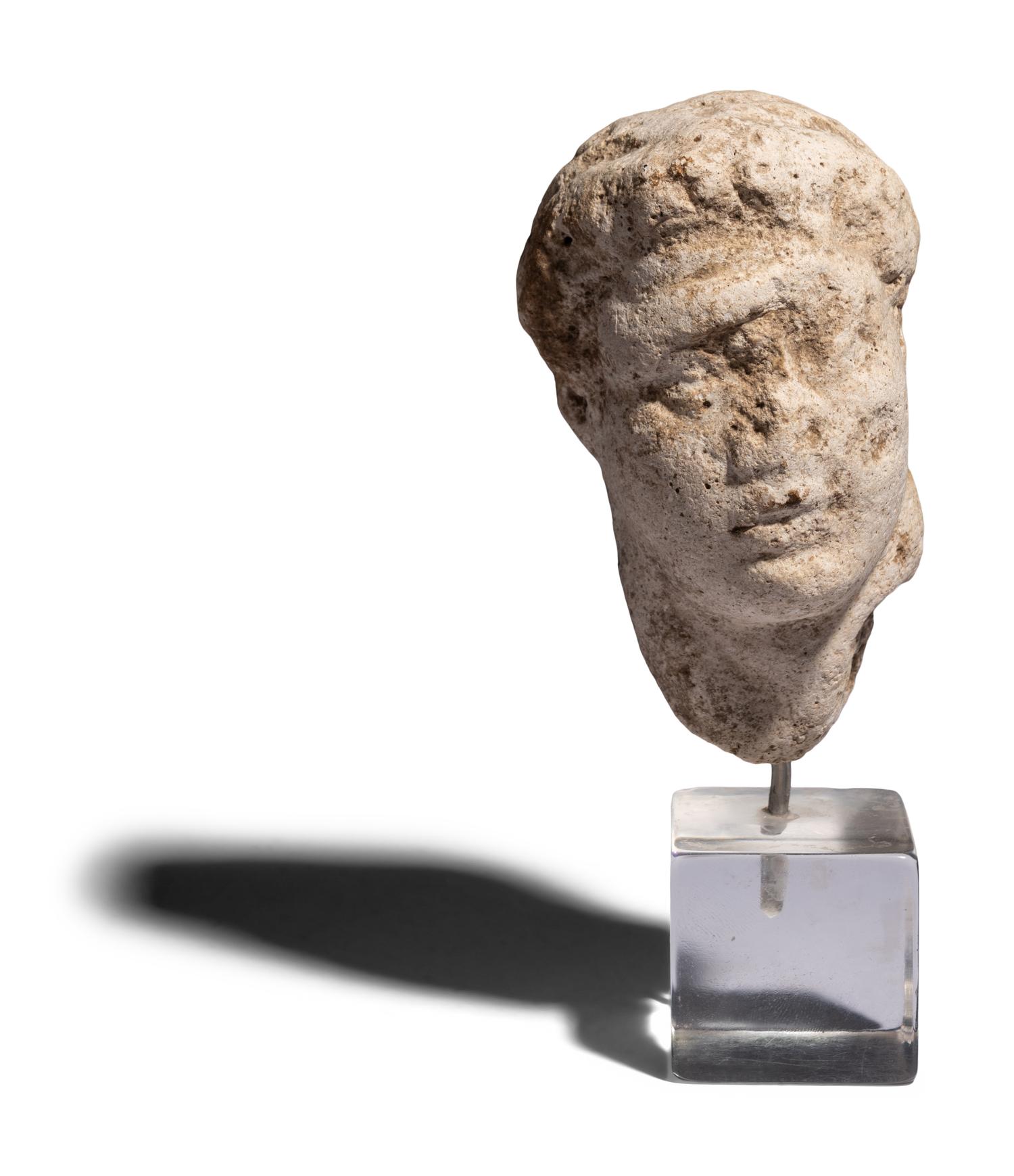 A Roman Marble Head of a Youth