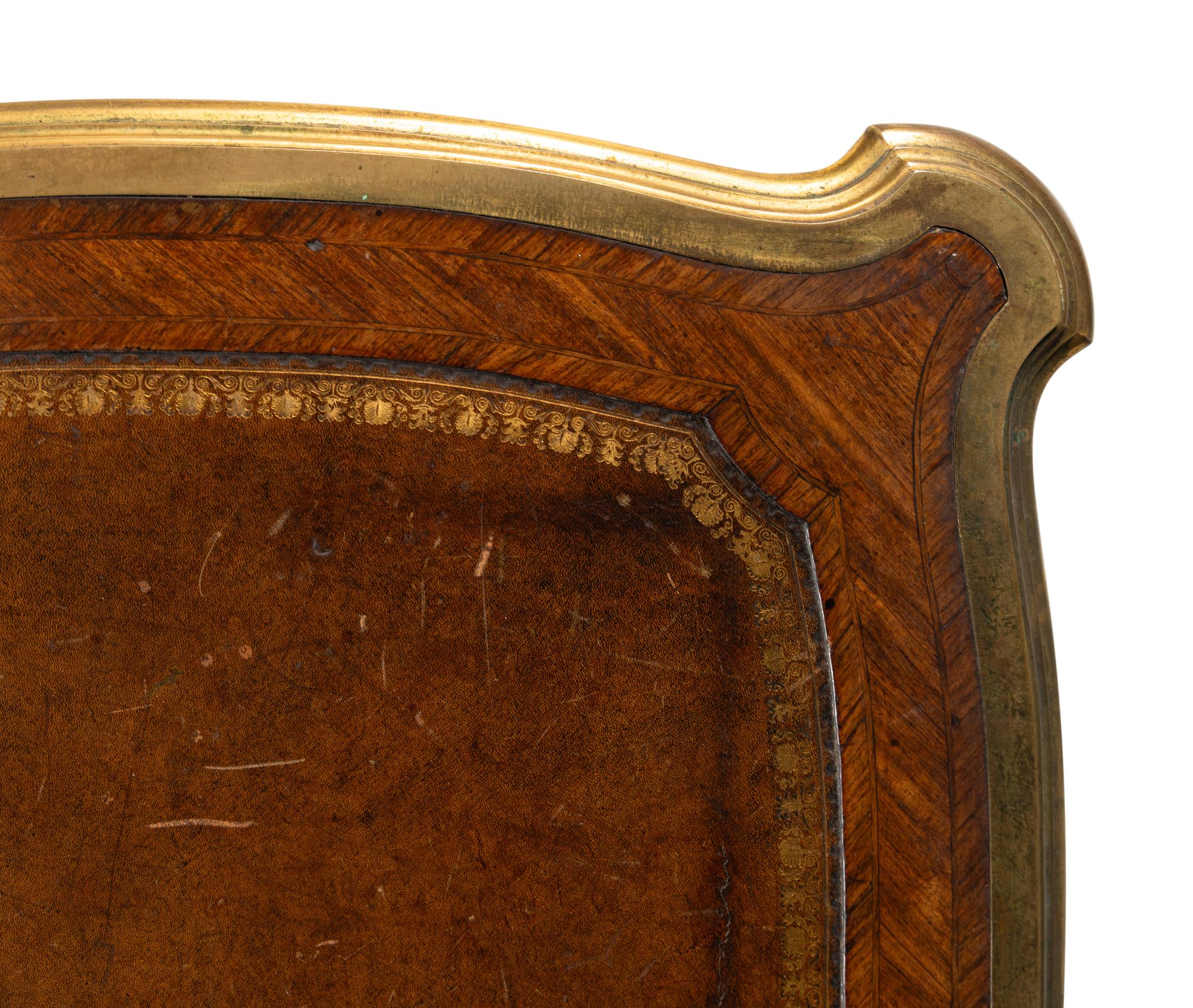 A Louis XV Style Gilt Bronze Mounted Parquetry Bureau Plat