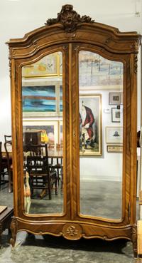 A Louis XV Style Walnut Armoire Height 90 x width 54 x depth 22 inches. — 19TH/20TH CENTURY