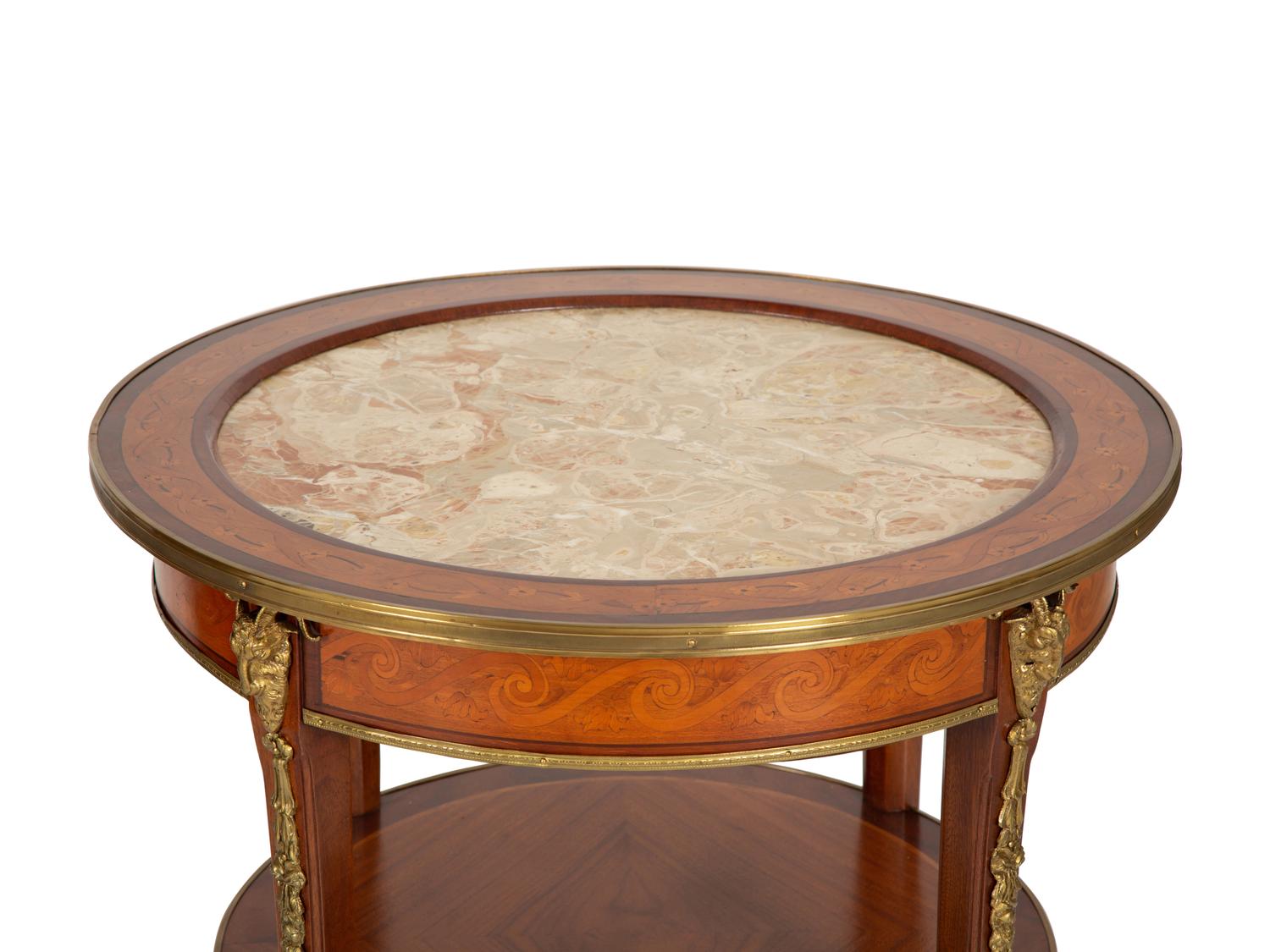 A Pair of Louis Philippe Style Gilt-Bronze Mounted Mahogany Side Tables with Inset Marble Top.