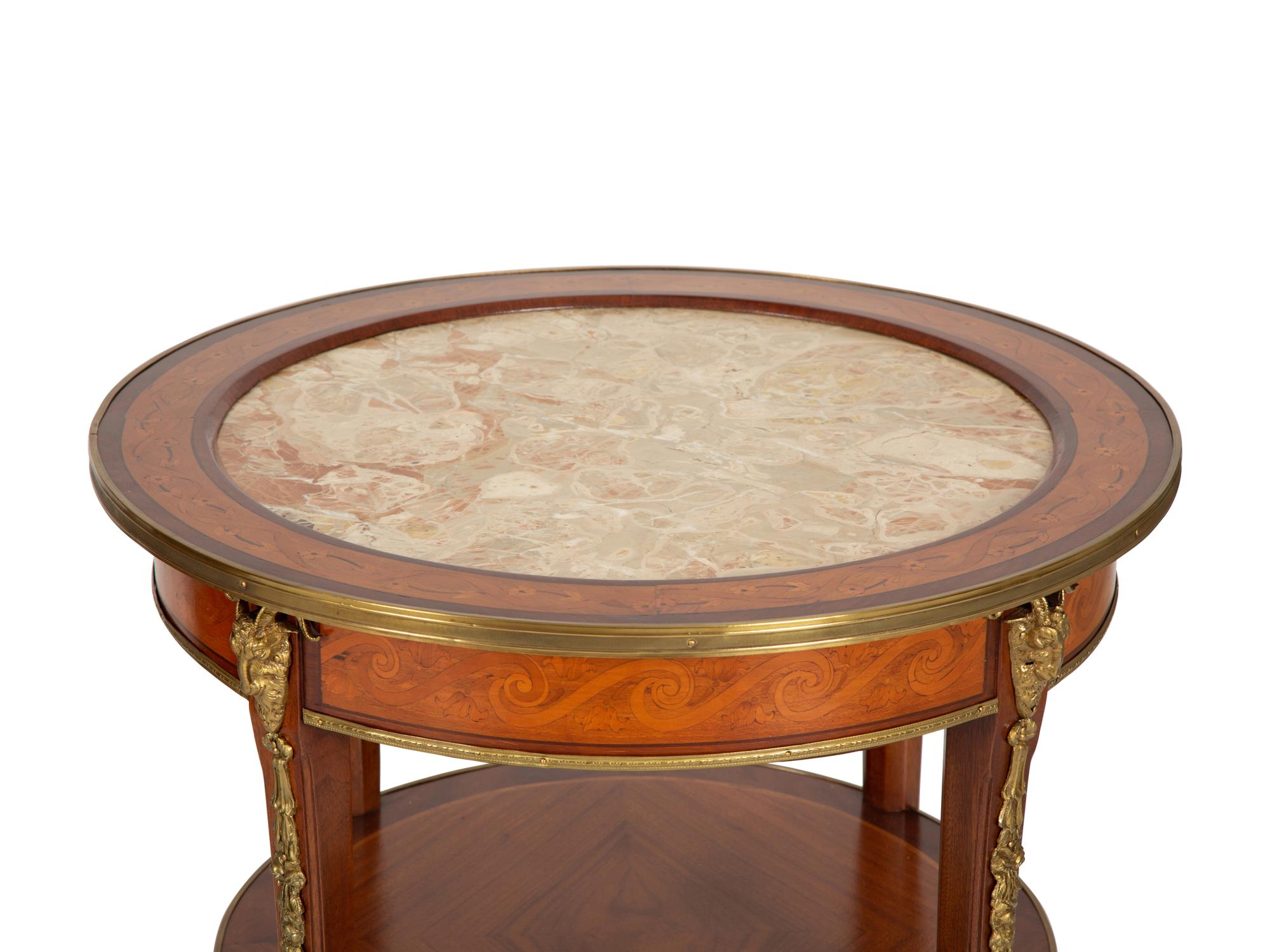 A Pair of Louis Philippe Style Gilt-Bronze Mounted Mahogany Side Tables with Inset Marble Top.
