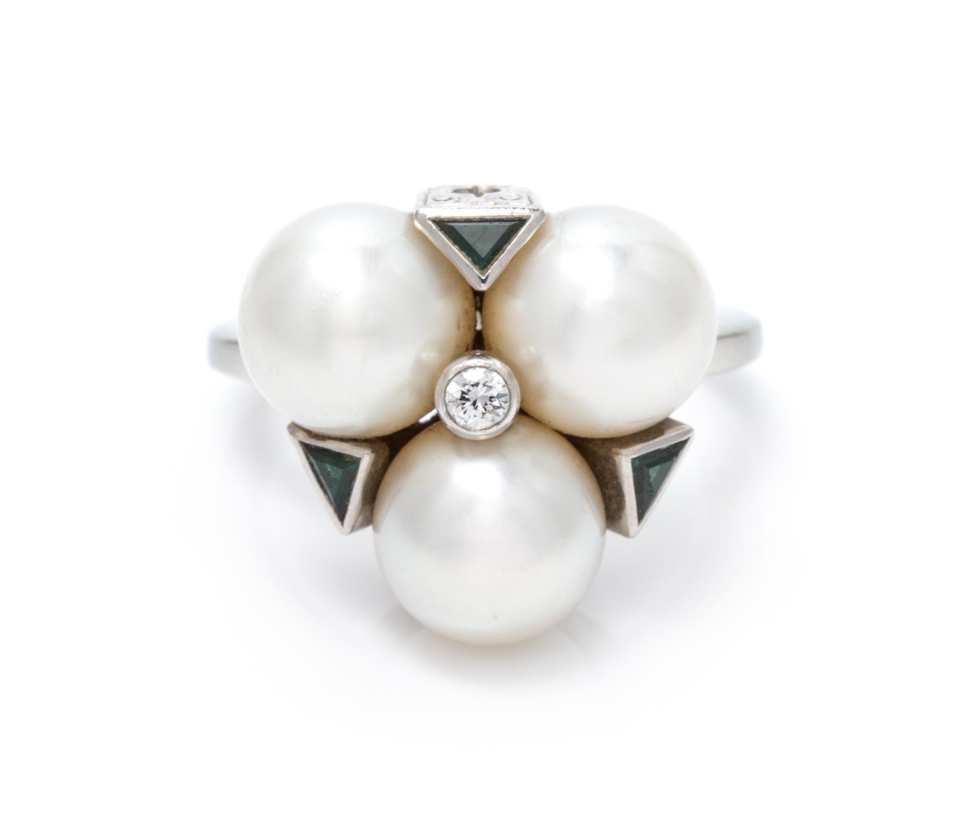 A 14 Karat White Gold Cultured Pearl, Emerald and Diamond Ring, 5.10 dwts.