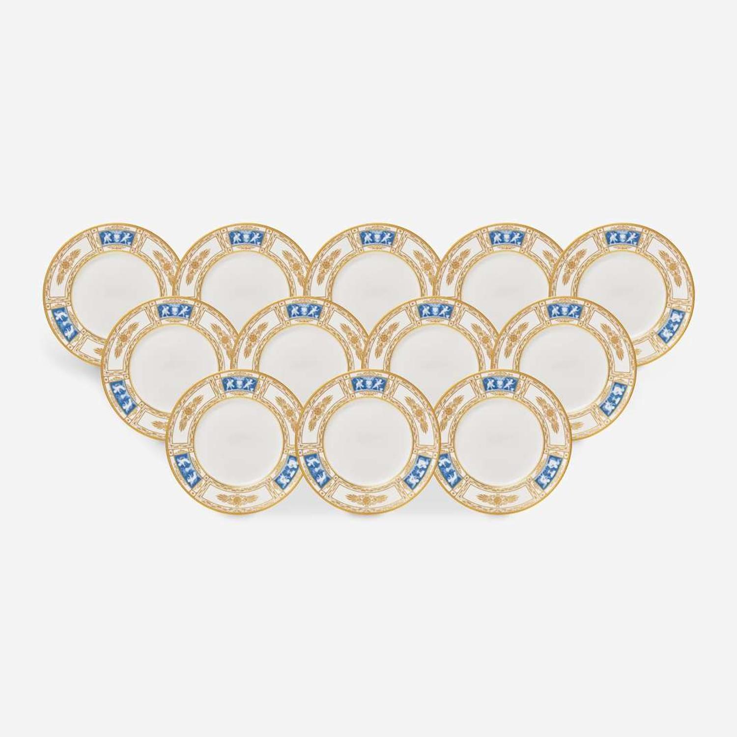 A set of twelve pate-sur-pate gilt and enameled porcelain dinner plates Minton, England, retailed by Tiffany & Co., New York, NY, date marks for 1928-1929
