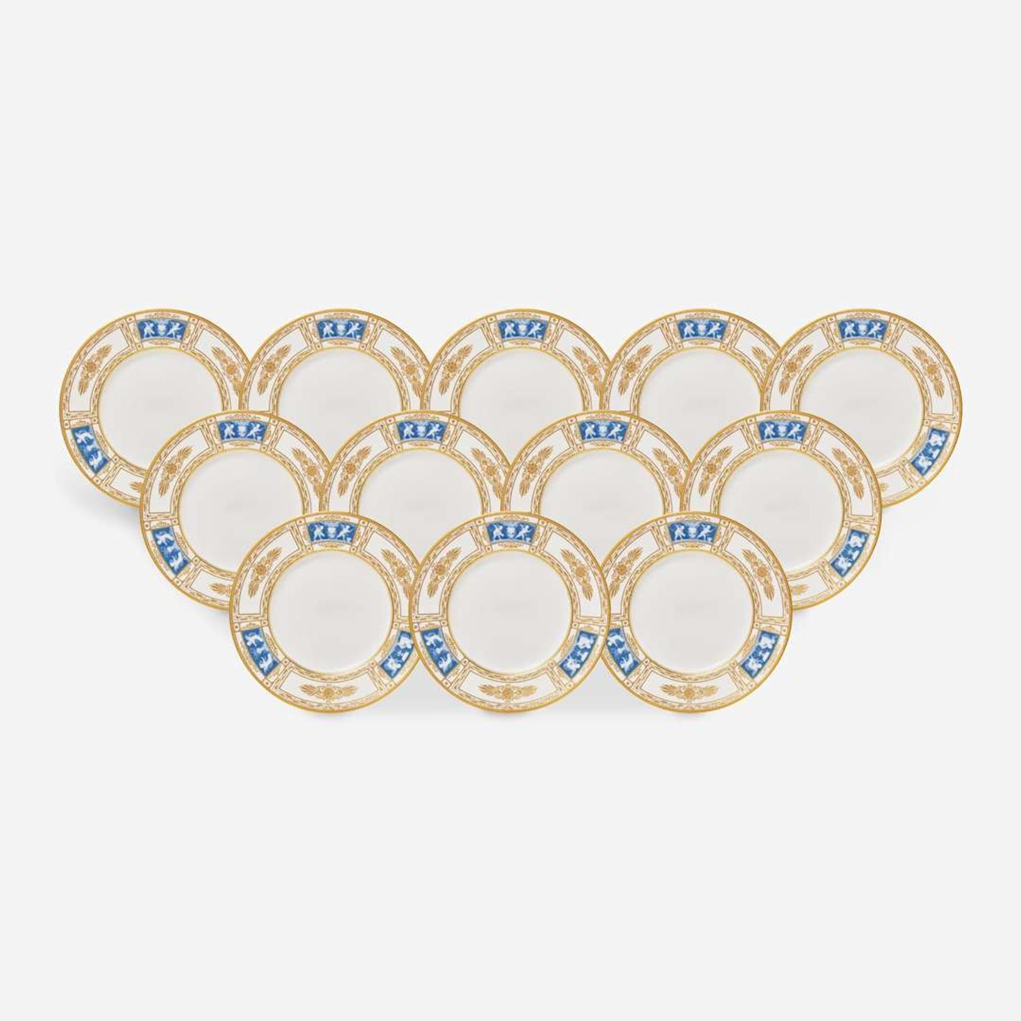 A set of twelve pate-sur-pate gilt and enameled porcelain dinner plates Minton, England, retailed by Tiffany & Co., New York, NY, date marks for 1928-1929