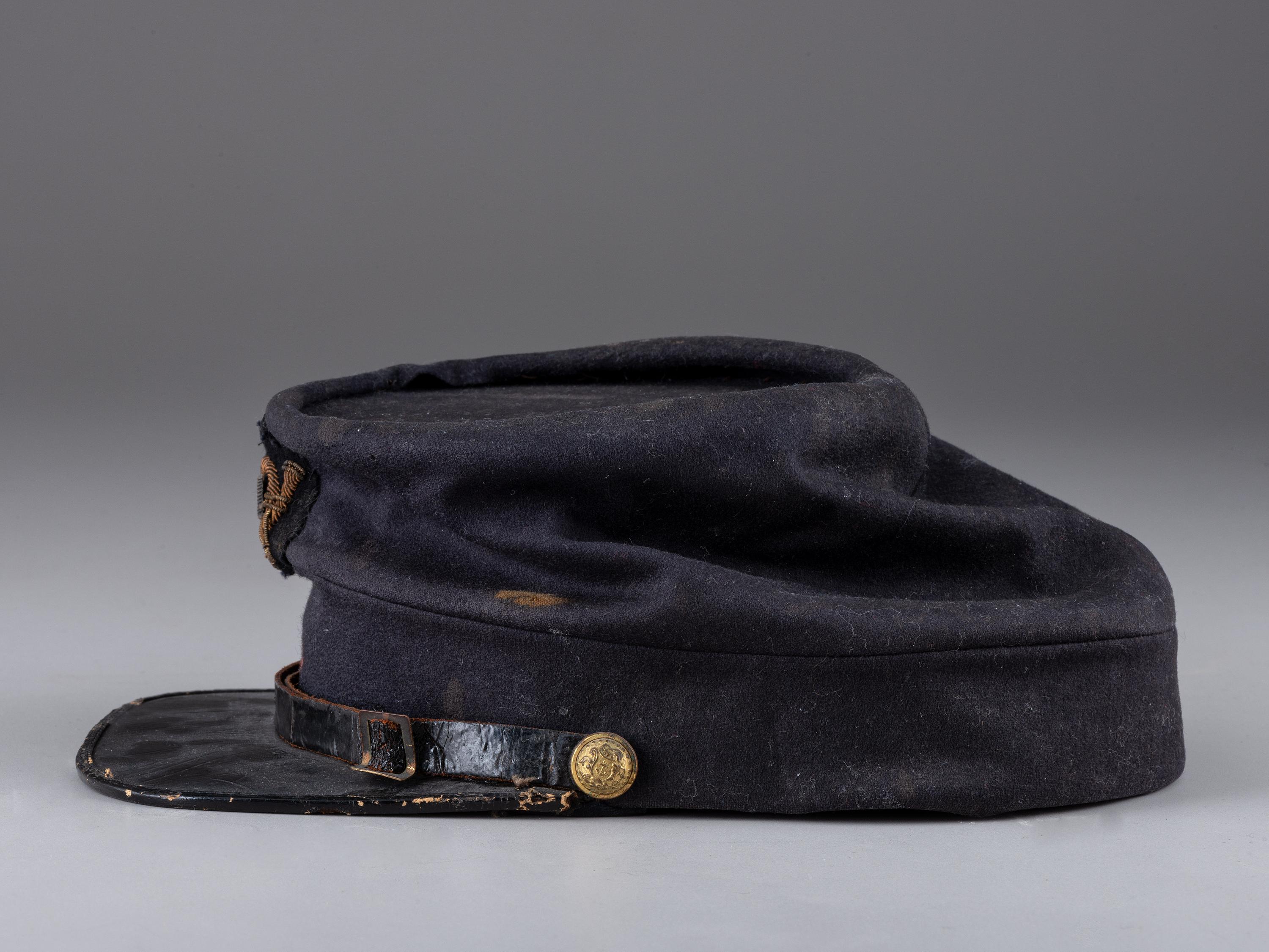 [CIVIL WAR]. 4th Rhode Island Infantry kepi identified to Captain Martin Page Buffum, POW at Petersburg. [ With :] ALLEN, George H. Forty-Six Months with the Fourth R.I. Volunteers.
