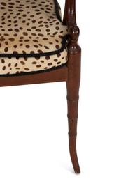 A Set of Four Regency Style Mahogany Cane Seat Dining Chairs