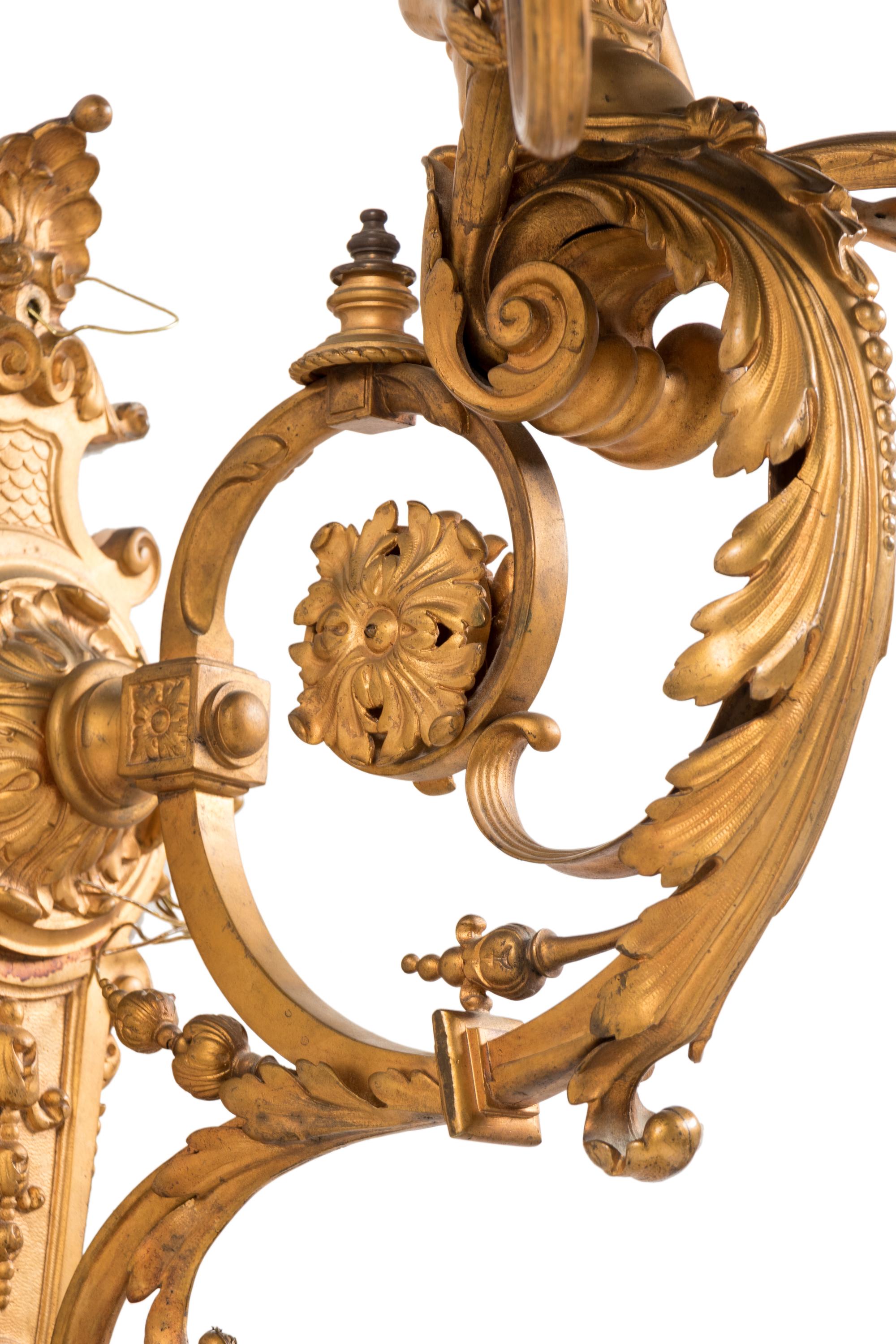 A Pair of French Neoclassical Gilt Bronze Eight-Light Sconces