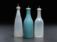 Three Opalescent Swirl Glass Barber Bottles