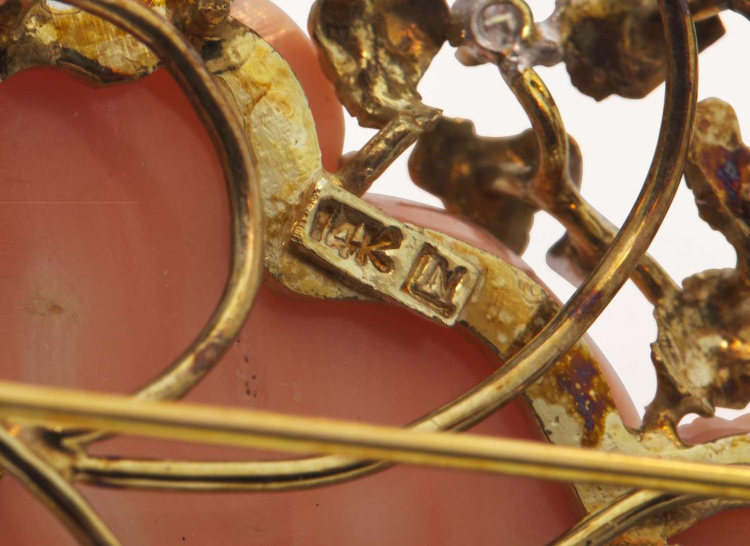 A Pair of Gold and Gemstone Brooches