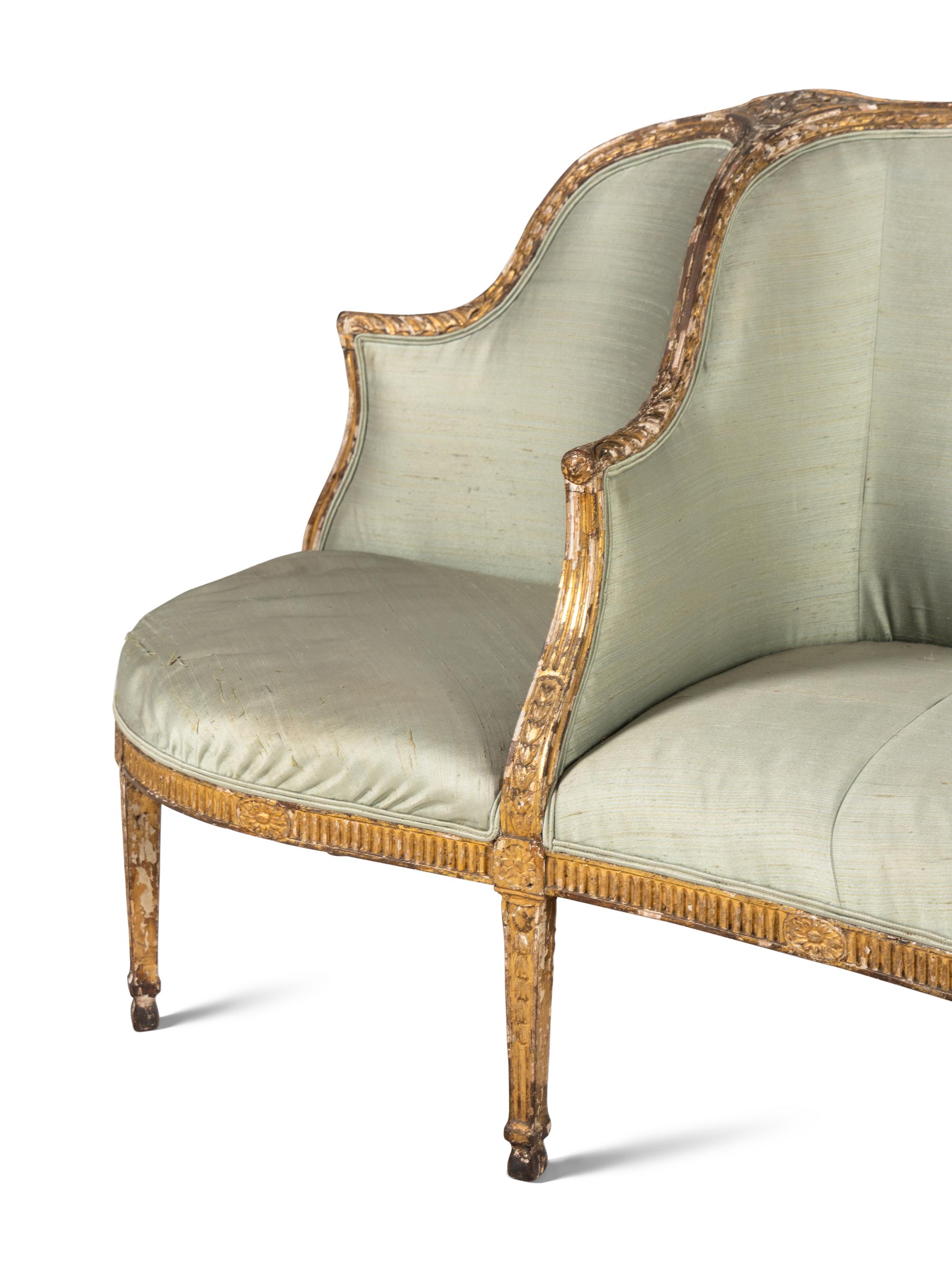 A George III Giltwood Confidante Sofa