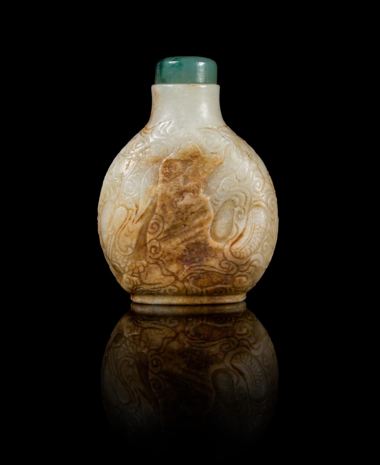 A White and Russet Jade Snuff Bottle