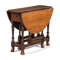 A Queen Anne Oak Dropleaf Table