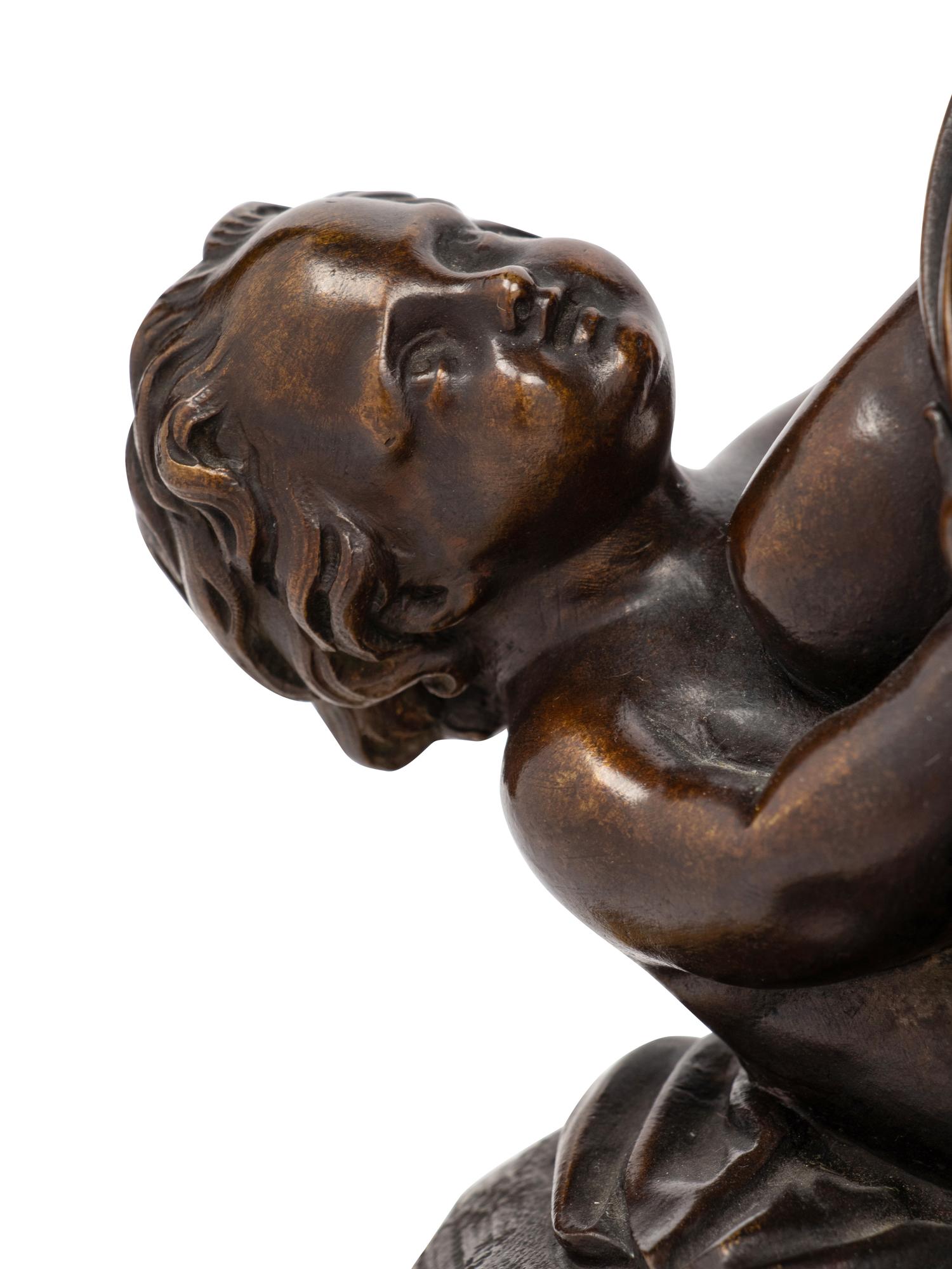 A Pair of French Gilt and Patinated Bronze and Marble Ornaments