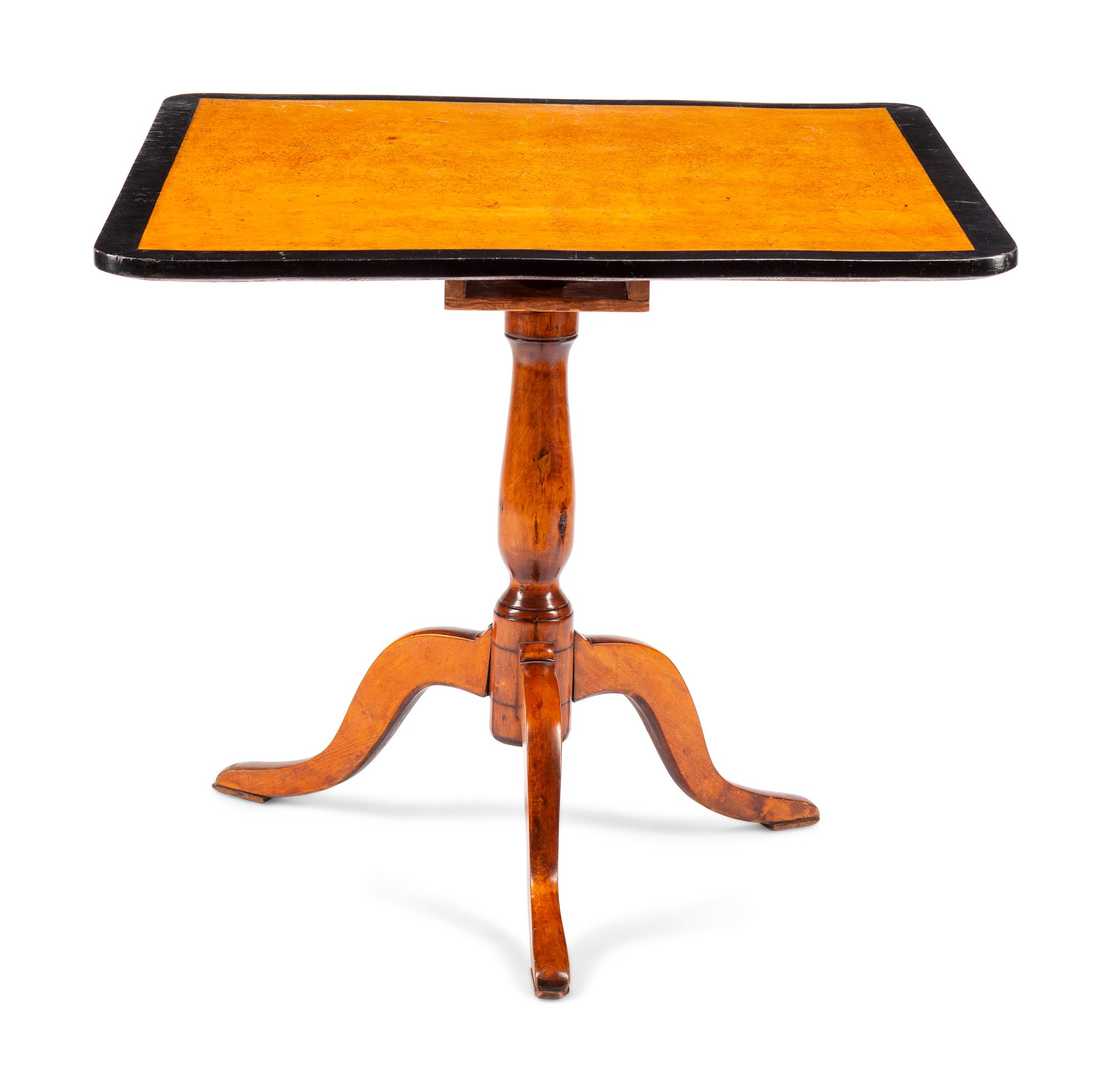 A Swedish Parcel Ebonized Birch Tilt-Top Table
