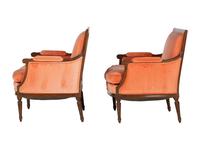 A Pair of Louis XVI Style Walnut Bergeres
