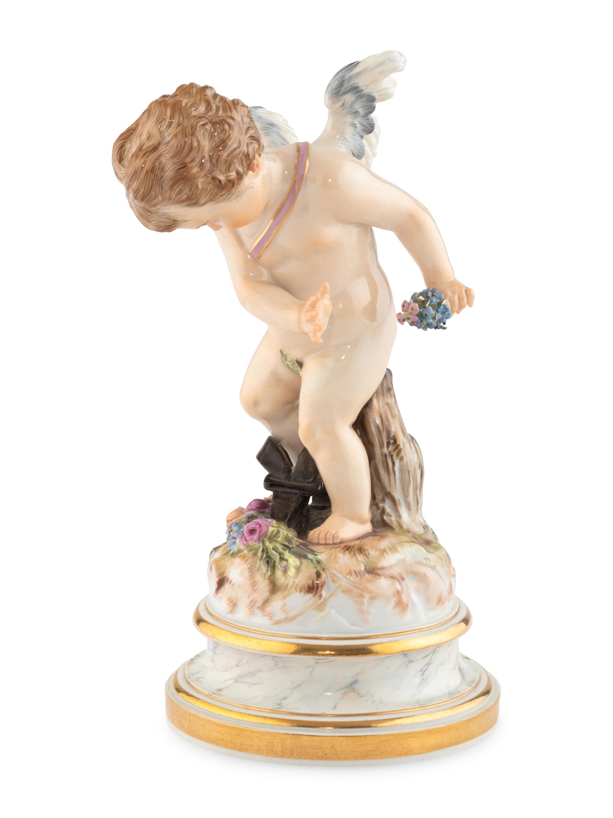A Meissen Porcelain Putto Figure