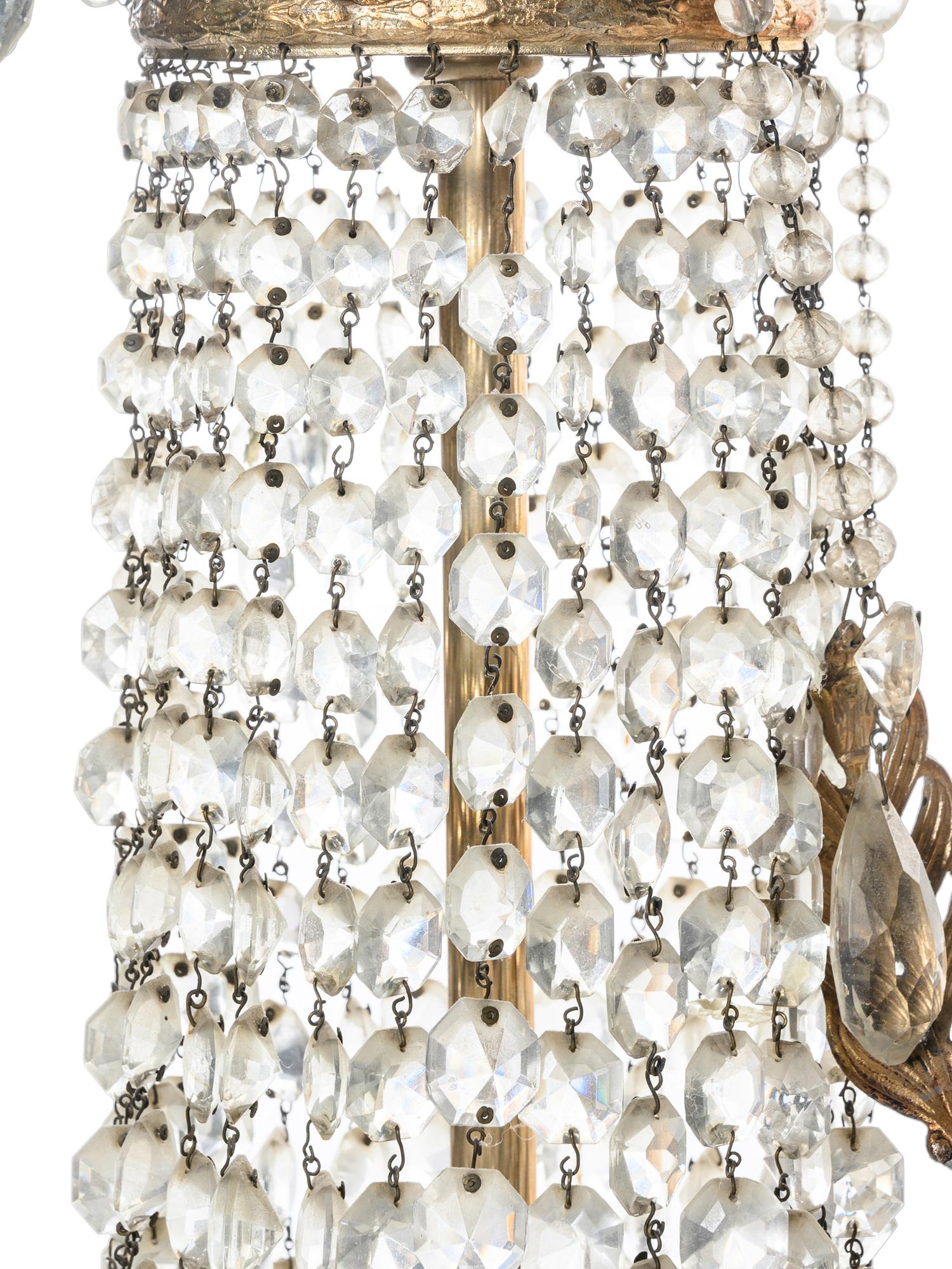 An Empire Style Cut Glass and Silvered Metal Chandelier