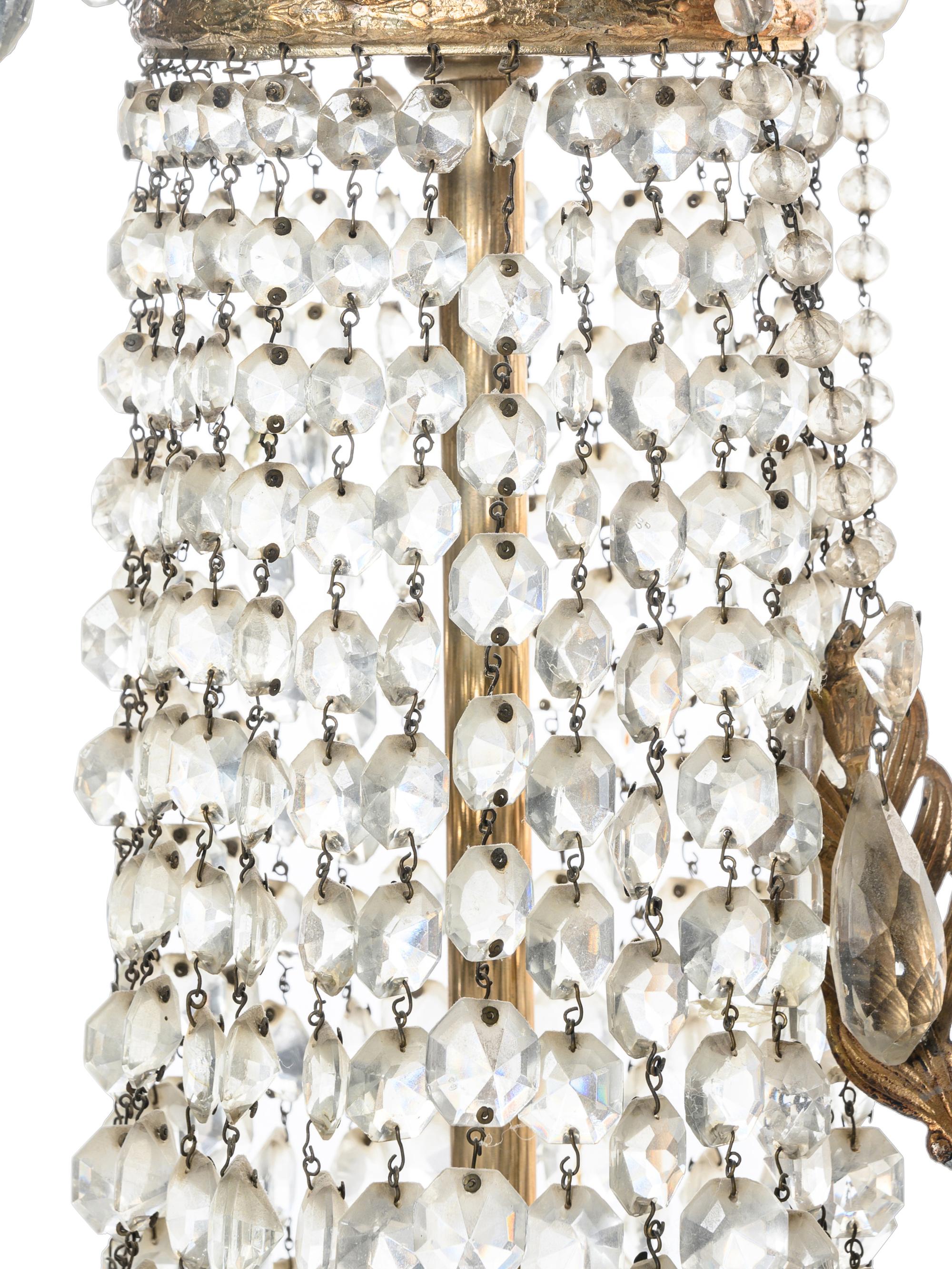 An Empire Style Cut Glass and Silvered Metal Chandelier