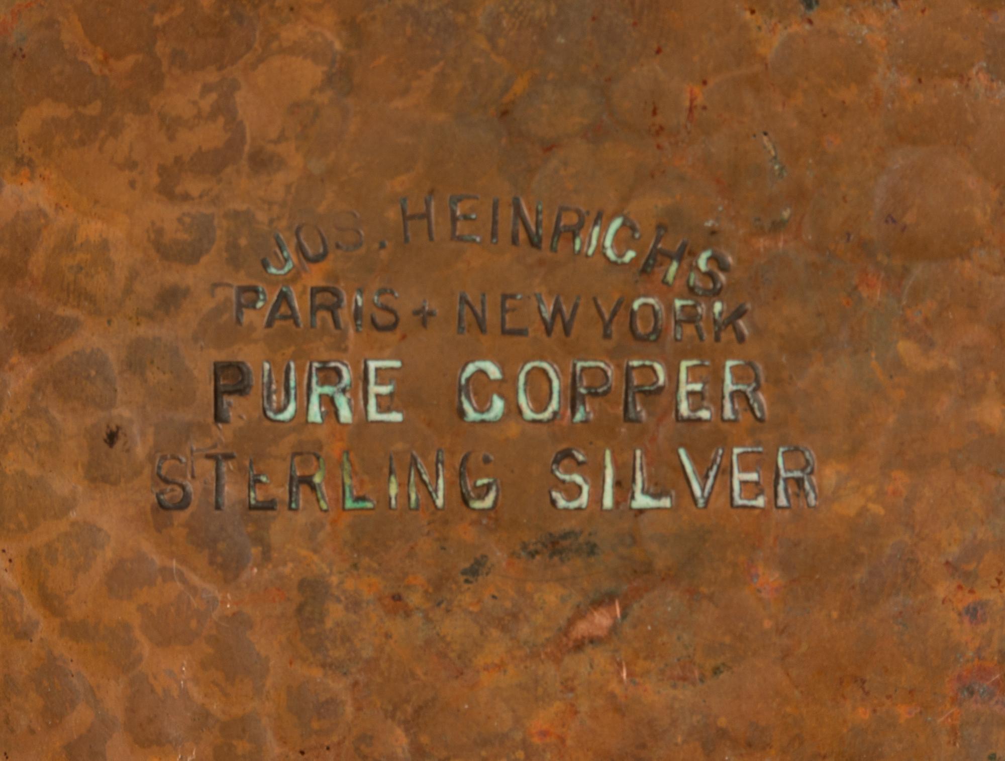A Joseph Heinrichs Hammered Copper on Silver Creamer and Sugar